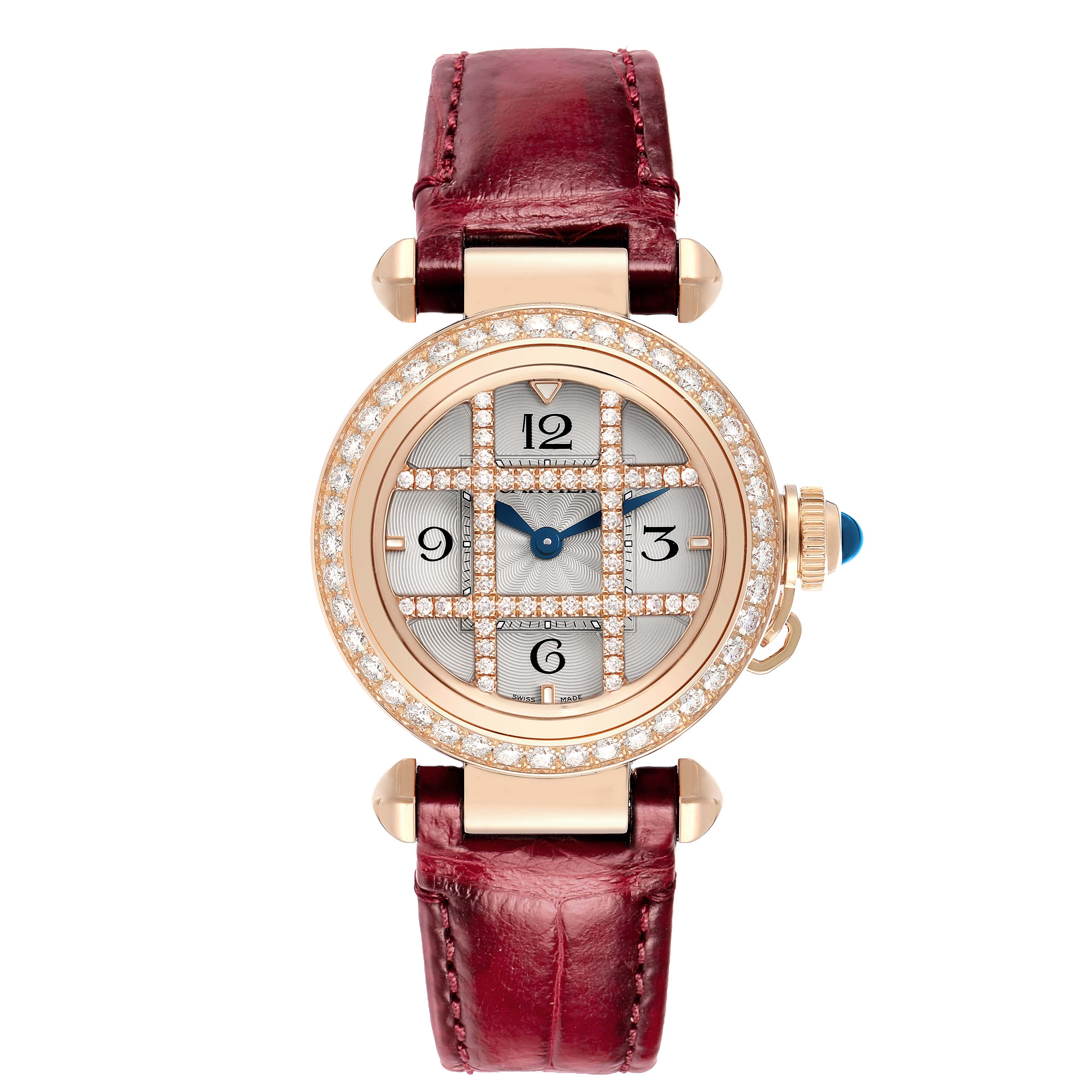 The Cartier Pasha WJPA Women's Rose Gold Silver Dial watch is shown from a top-down angle, highlighting its face, bezel, and burgundy strap.