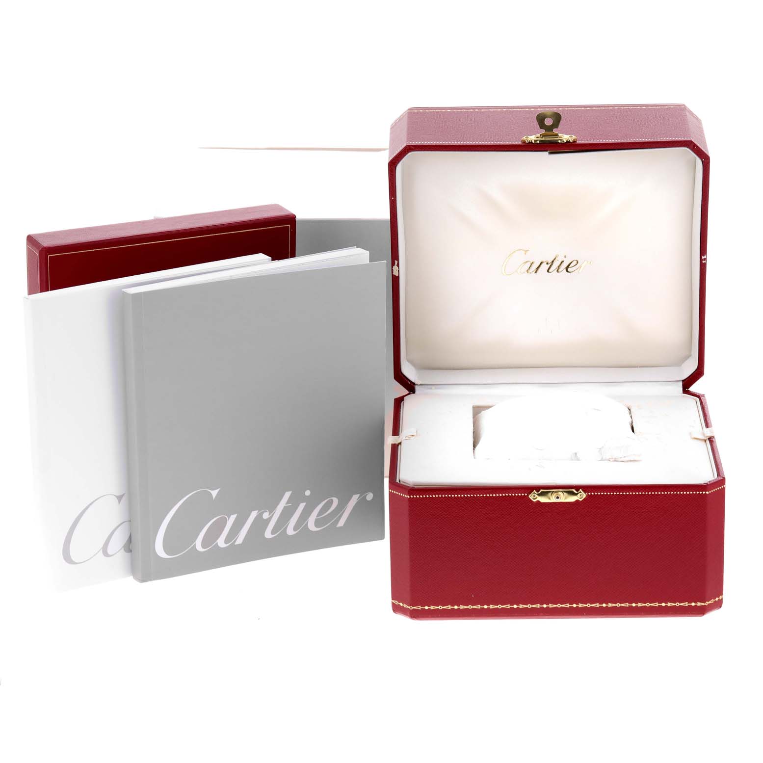 This image shows an open red Cartier Roadster W62041V3 Men
s Stainless Steel Black Dial W62041V3 Men
s Stainless Steel Black Dial watch box and accompanying manuals.