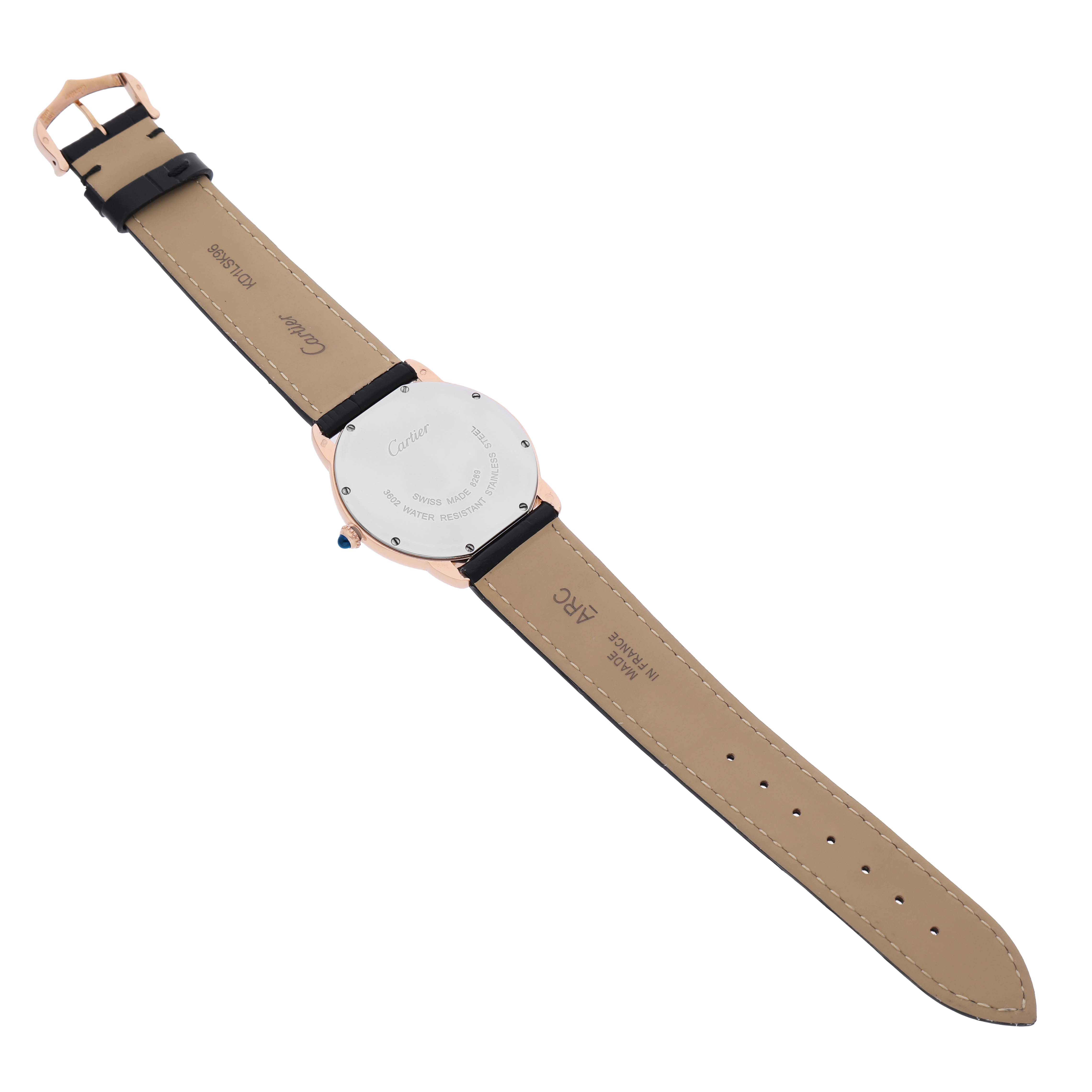 The Cartier Ronde W6701008 Men's Rose Gold Silver Dial watch is shown from the back, highlighting the case back, leather strap, and buckle.
