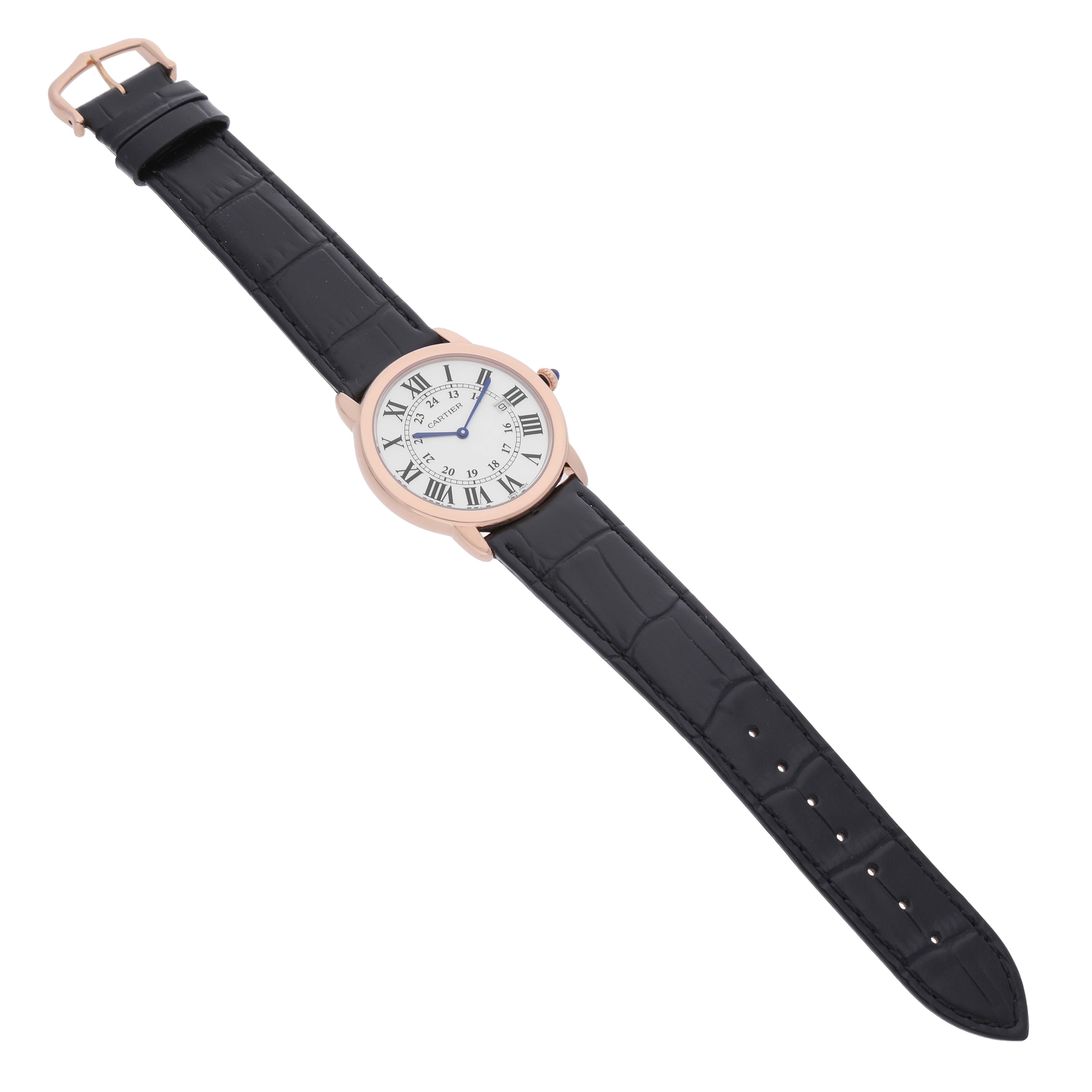 The Cartier Ronde W6701008 Men's Rose Gold Silver Dial watch is shown from an angled top view, featuring the face, bezel, and black leather strap.