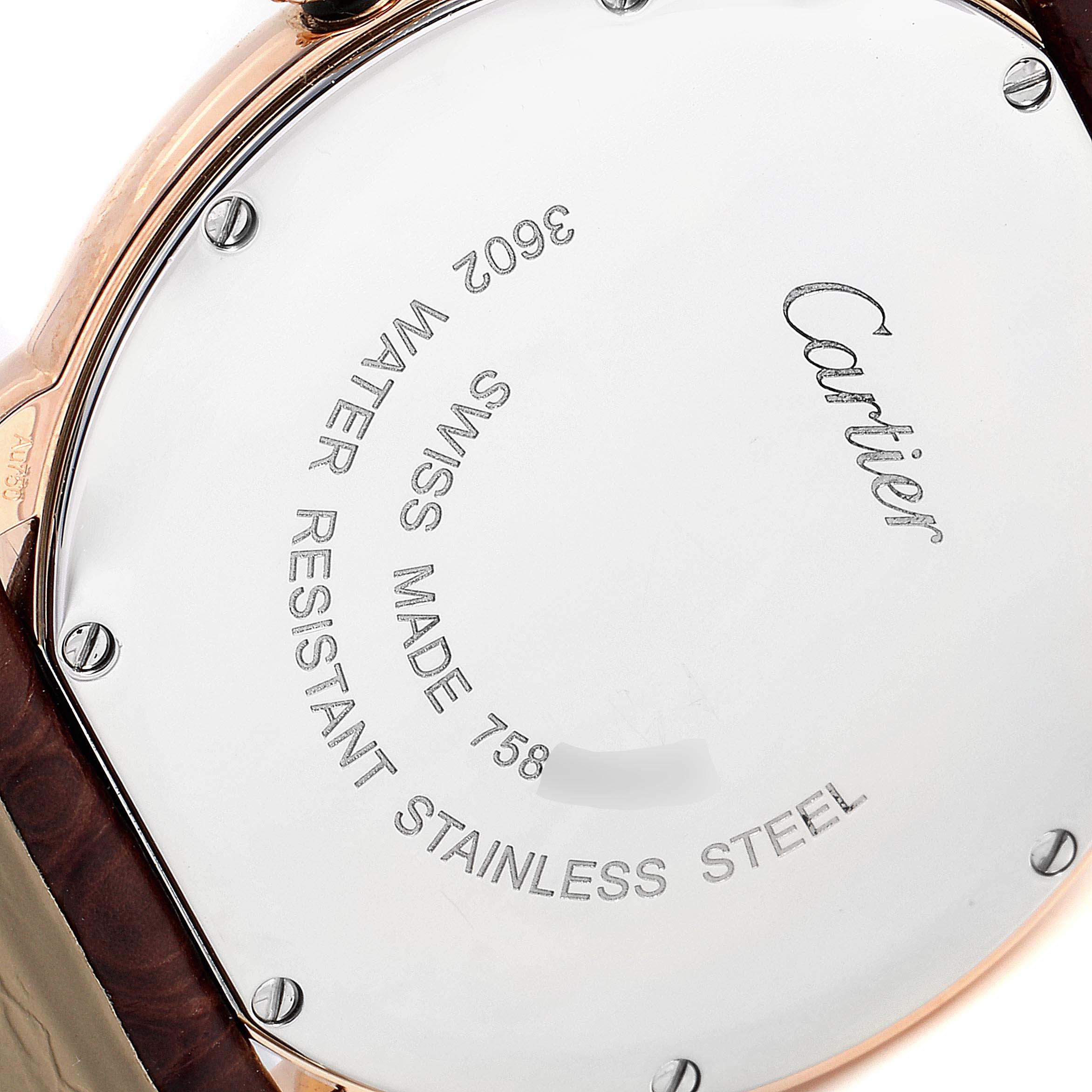 This image shows the case back of a Cartier Ronde W6701008 Men's Rose Gold Silver Dial W6701008 Men's Rose Gold Silver Dial model watch, highlighting engraving details and screws.