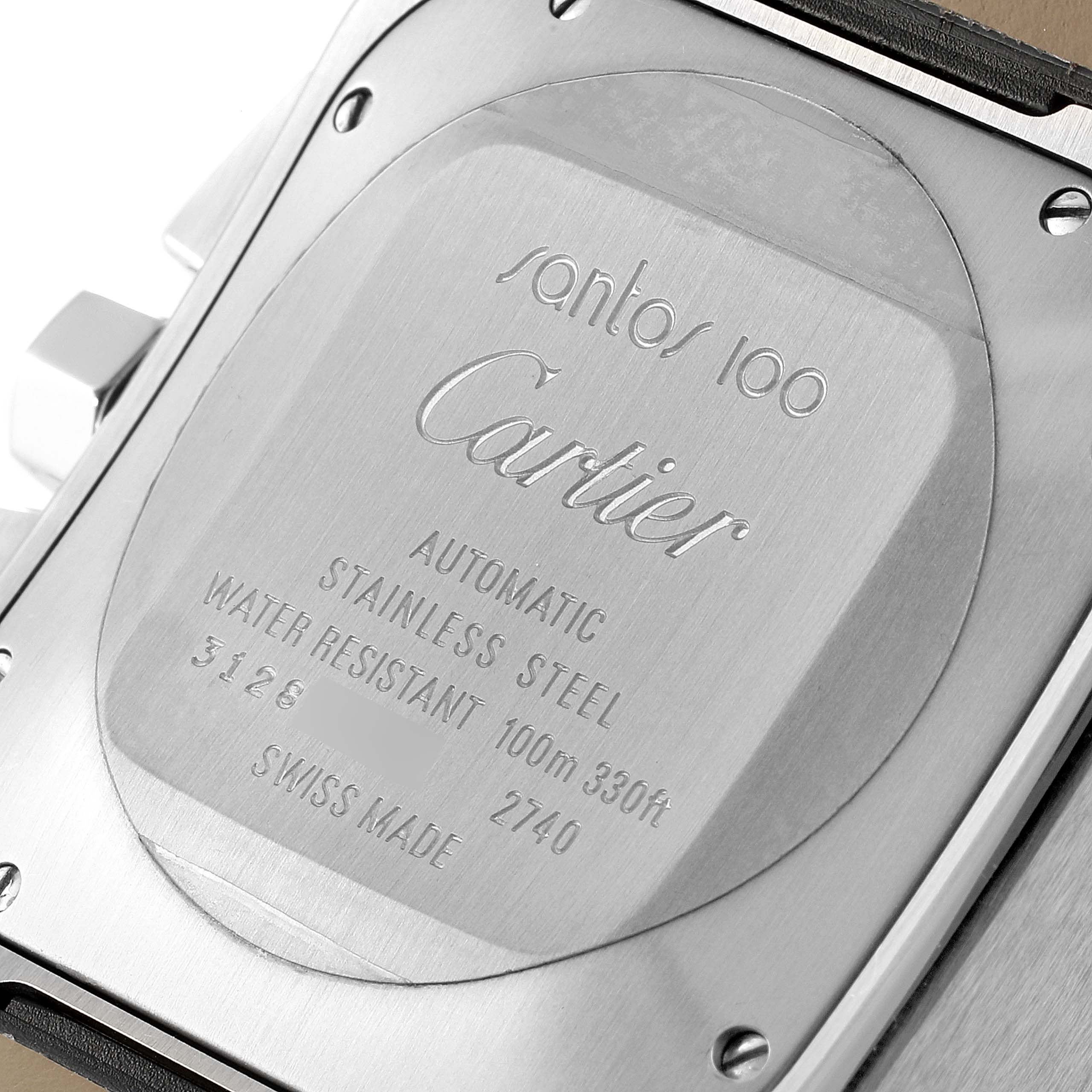 The image shows the back case of a Santos 100 watch by Cartier, including engravings of specifications.