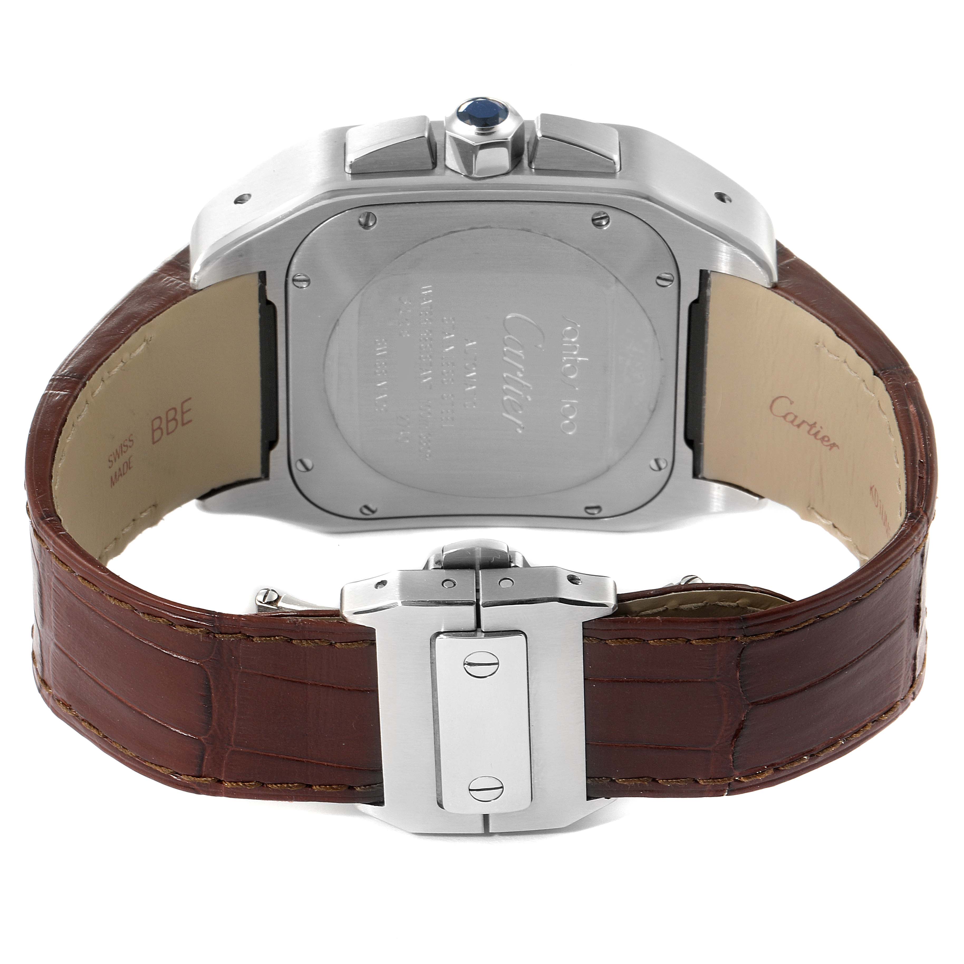 The image shows the back case and brown leather strap of a Cartier Santos W20090X8 Men
s Stainless Steel Silver Dial W20090X8 Men
s Stainless Steel Silver Dial watch, highlighting the case back details and clasp.