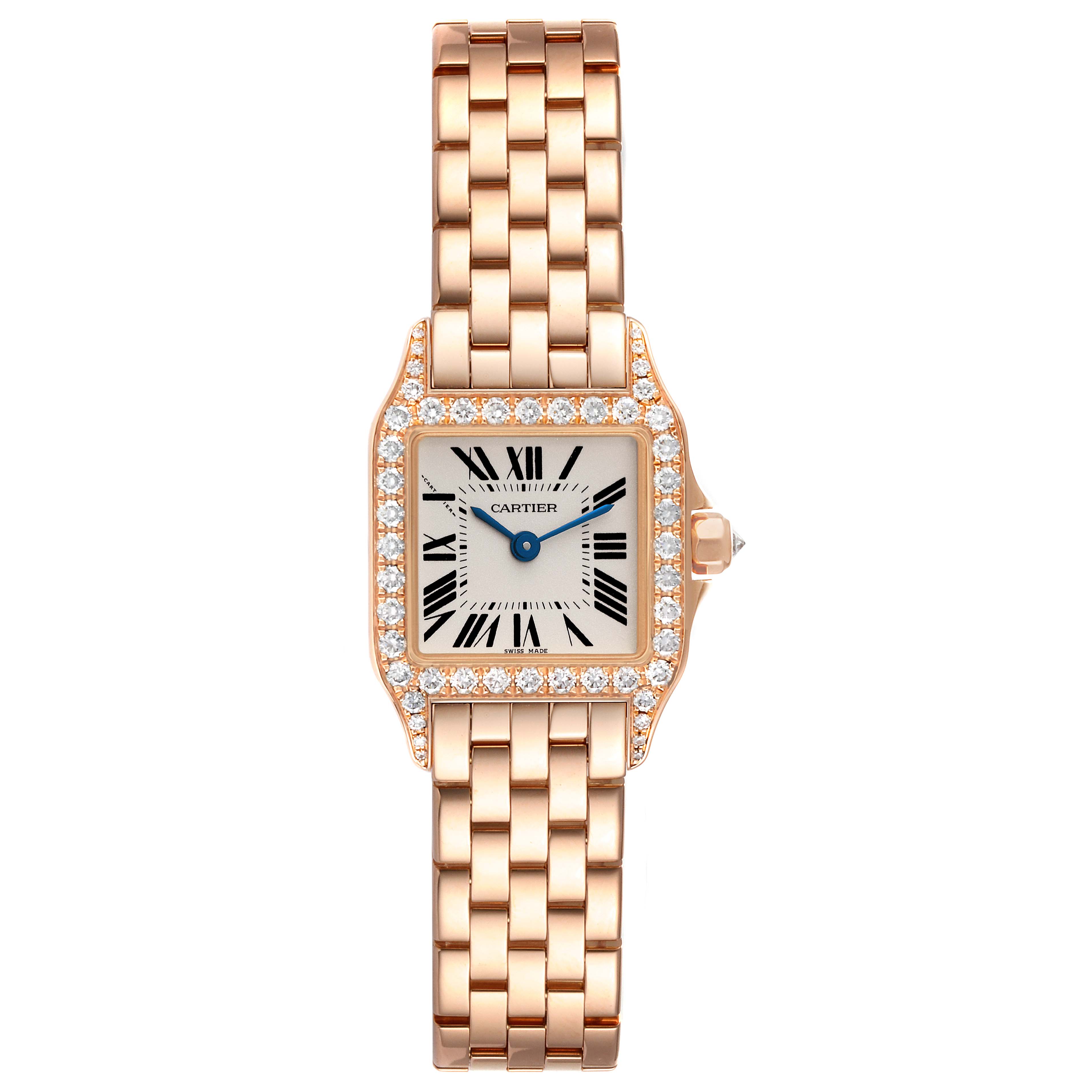 The image shows a Cartier Santos Demoiselle WF9011Z8 Women's Rose Gold Silver Dial WF9011Z8 Women's Rose Gold Silver Dial watch from a front angle, highlighting its face, diamond bezel, and metal bracelet.