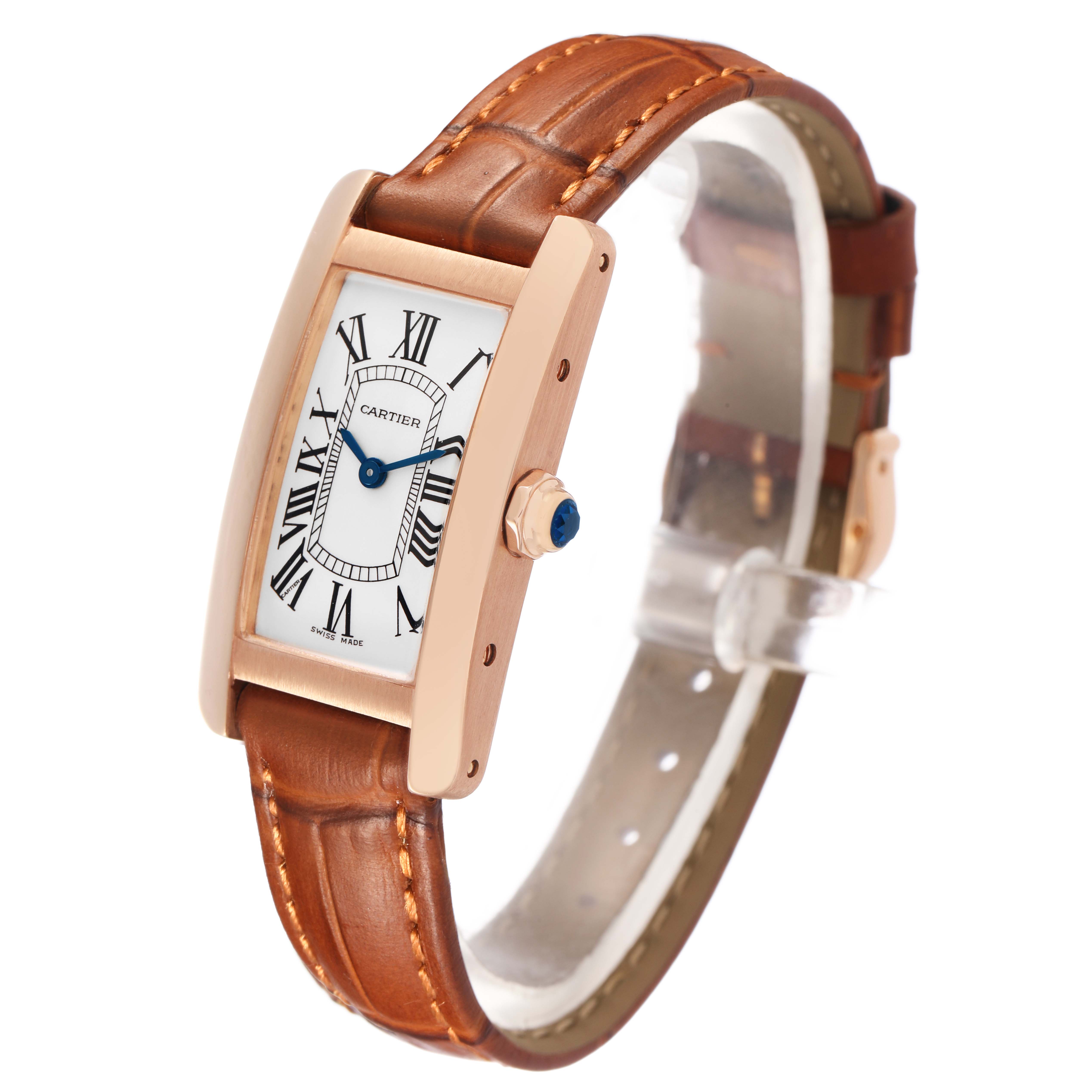 The Cartier Tank Americaine W2607456 Women's Rose Gold Silver Dial watch is shown at a three-quarter angle, displaying its face, crown, case, and leather strap.