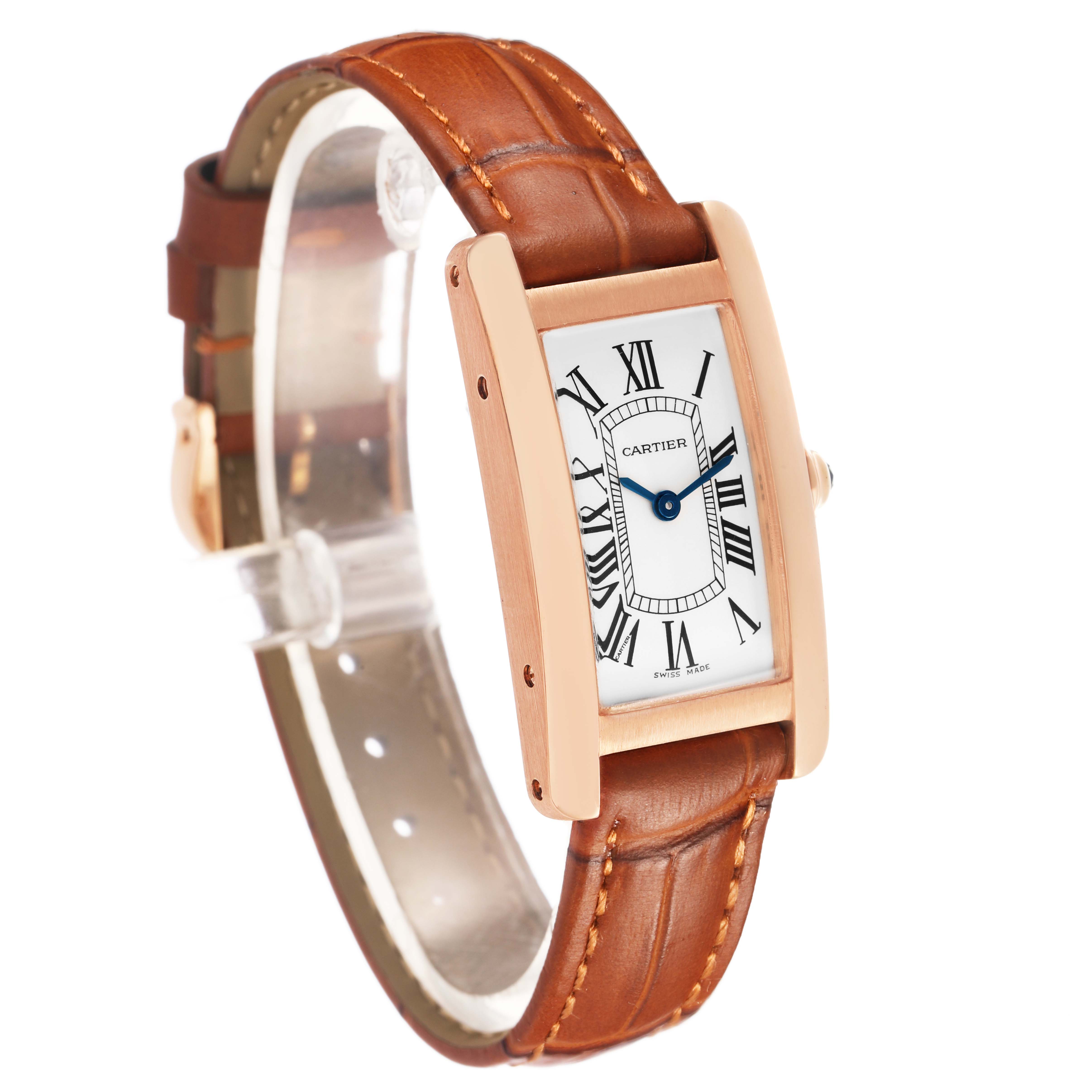 The Cartier Tank Americaine W2607456 Women's Rose Gold Silver Dial watch is shown from a three-quarter angle, highlighting its rectangular face and brown leather strap.