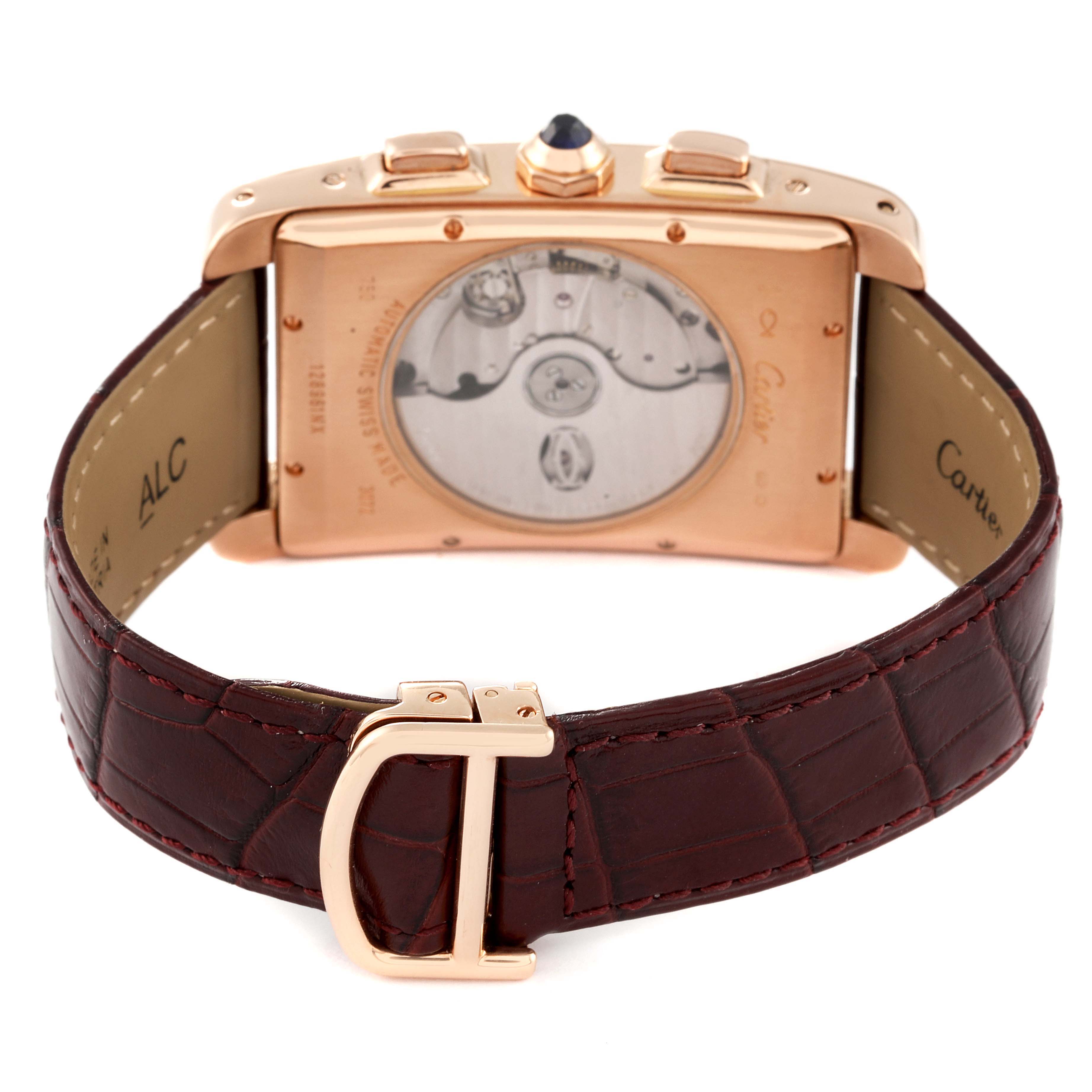 The image shows the back view of the Tank Americaine model by Cartier, revealing the watch
s leather strap and mechanical movement.