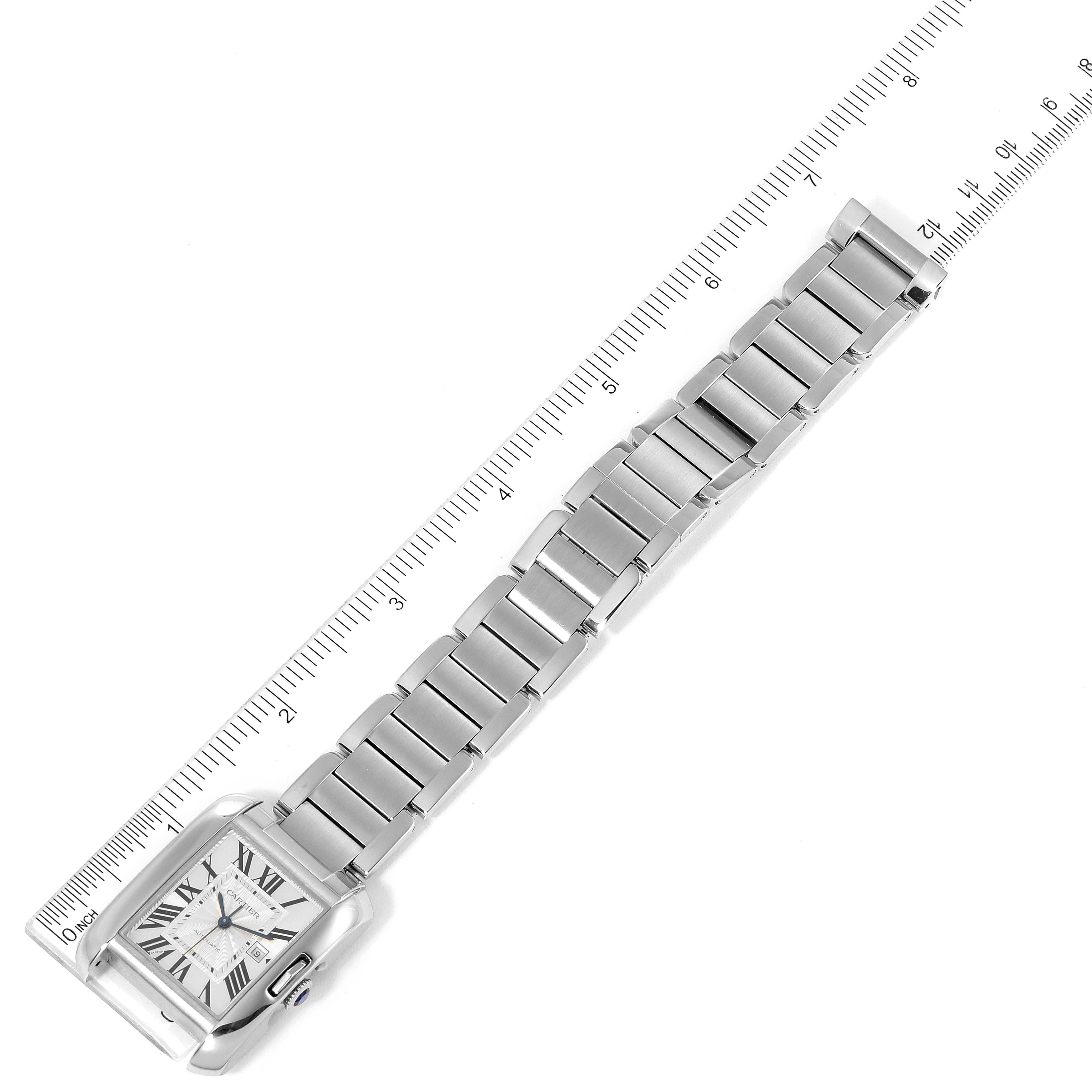 The image shows the Tank Anglaise model by Cartier from a top-down angle, highlighting its rectangular face and metal link bracelet.