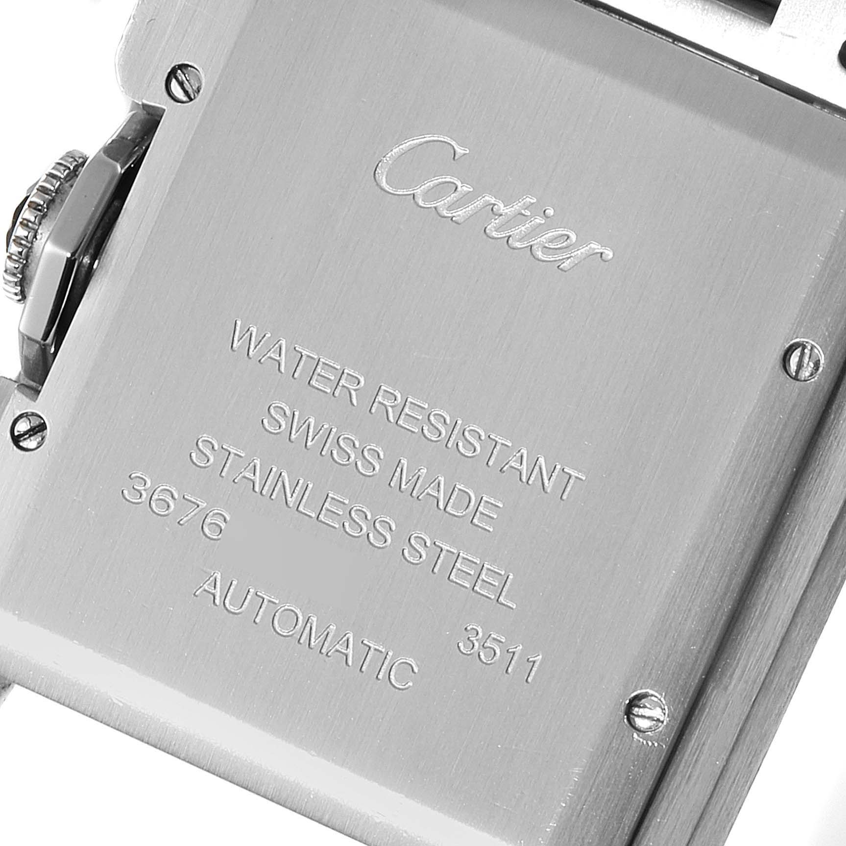 The image shows a close-up of the back of a Cartier Tank Anglaise W5310009 Men's Stainless Steel Silver Dial W5310009 Men's Stainless Steel Silver Dial watch, highlighting the brand engraving and specifications.