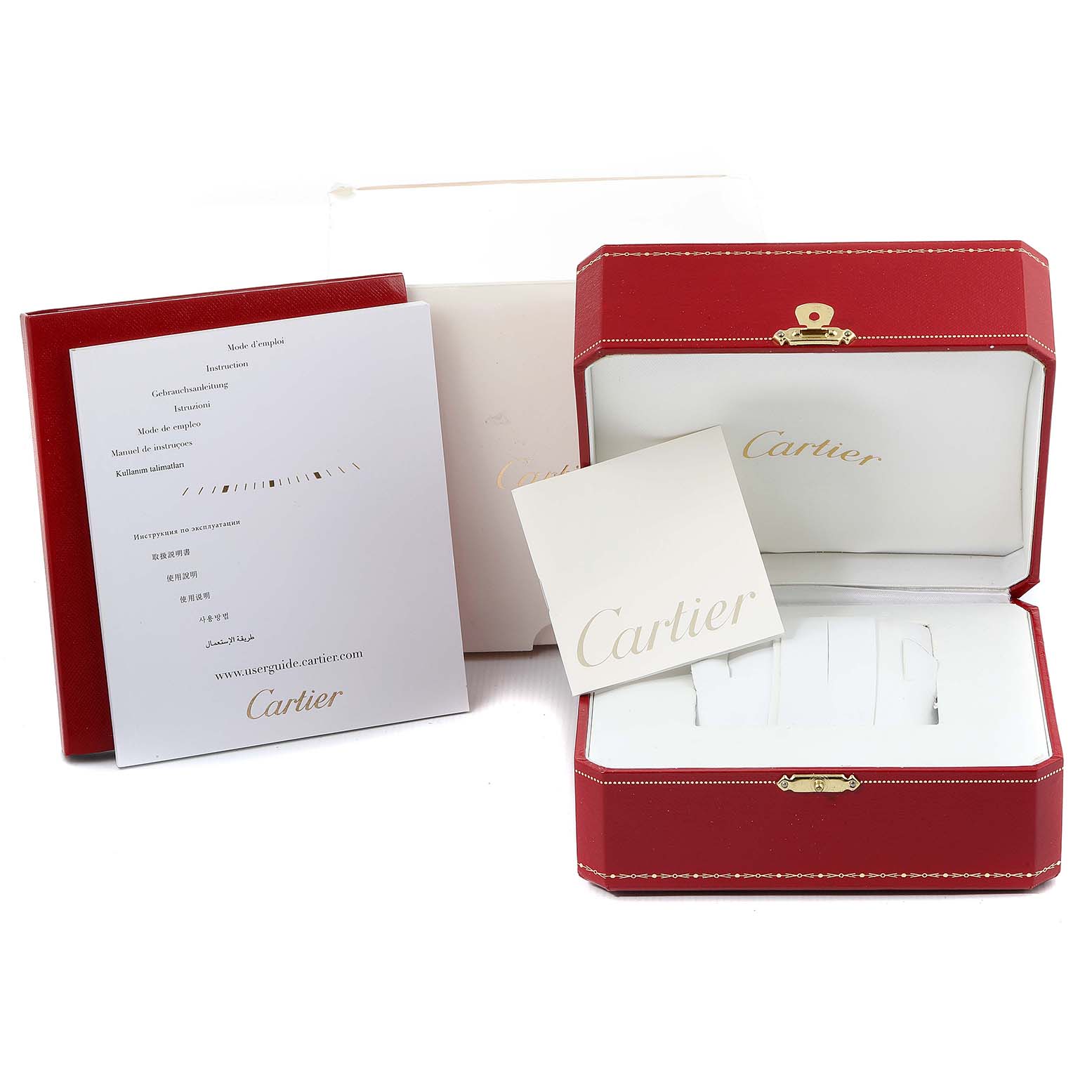 The image shows the packaging and documentation of a Cartier Tank Anglaise W5310009 Men's Stainless Steel Silver Dial W5310009 Men's Stainless Steel Silver Dial watch, including a red box and instruction manuals.