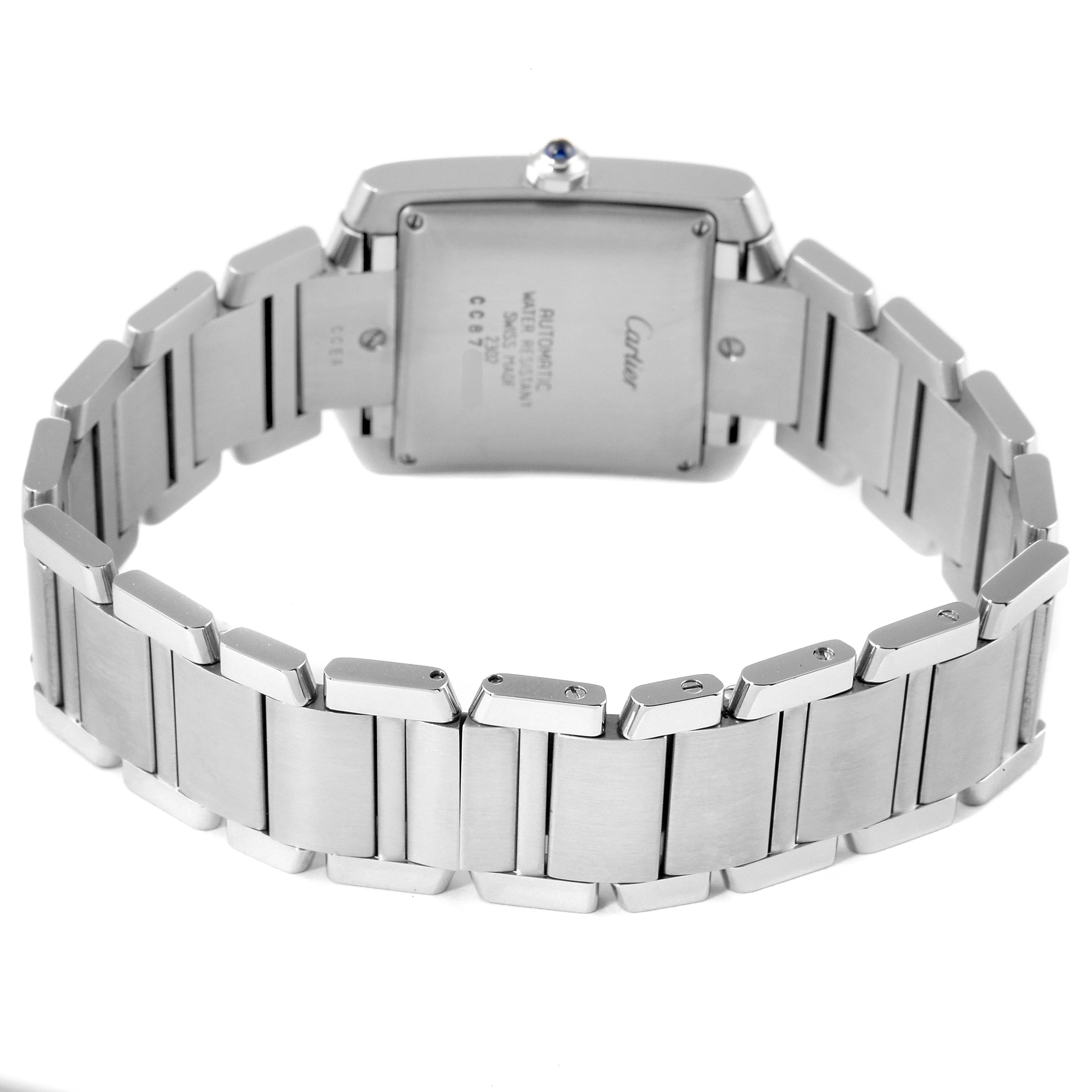 The image shows the back view of a Cartier Tank Francaise W51002Q3 Men's Stainless Steel Silver Dial W51002Q3 Men's Stainless Steel Silver Dial watch, highlighting the case back and metallic bracelet.