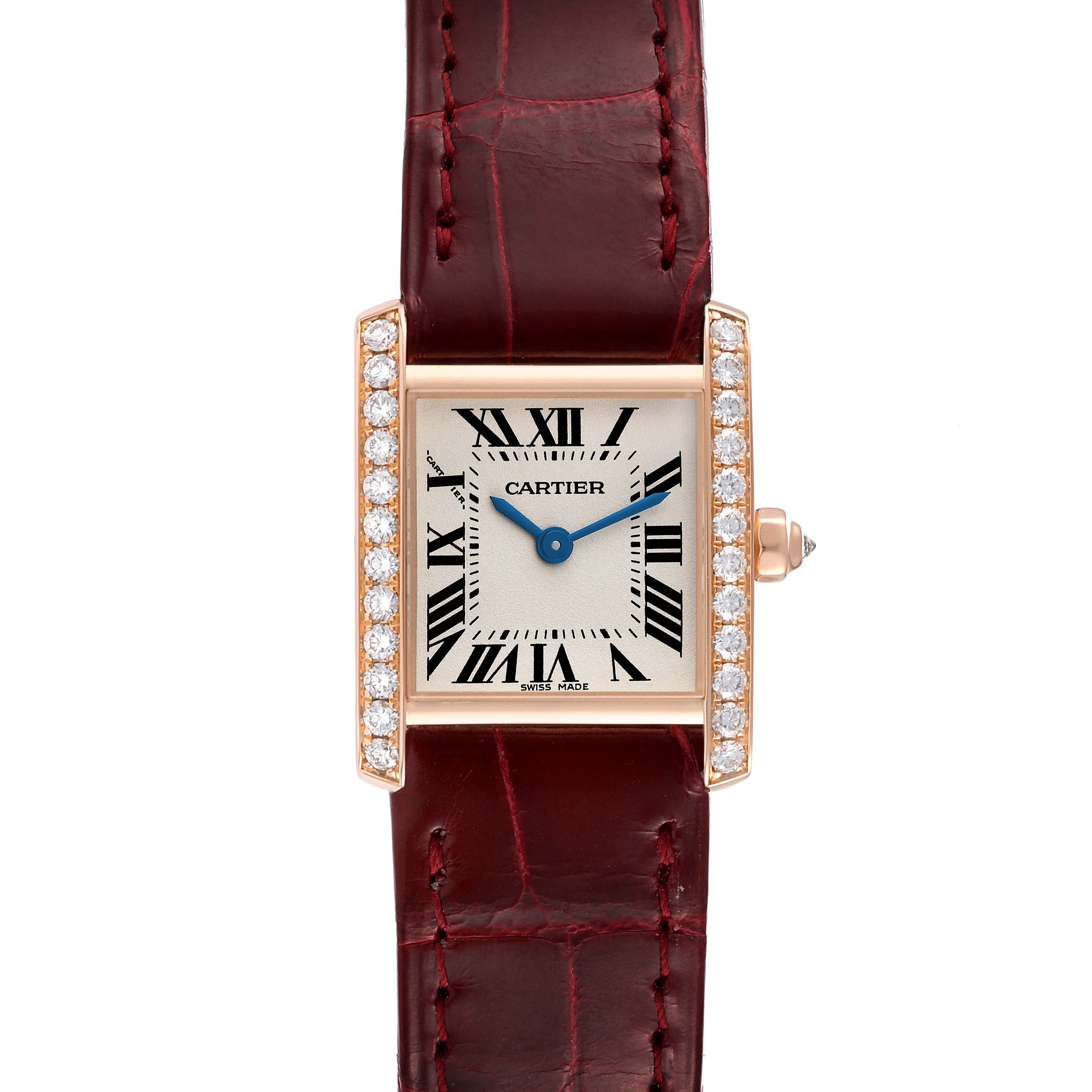 The image shows the face and strap of a Cartier Tank Française watch from a top-down angle.