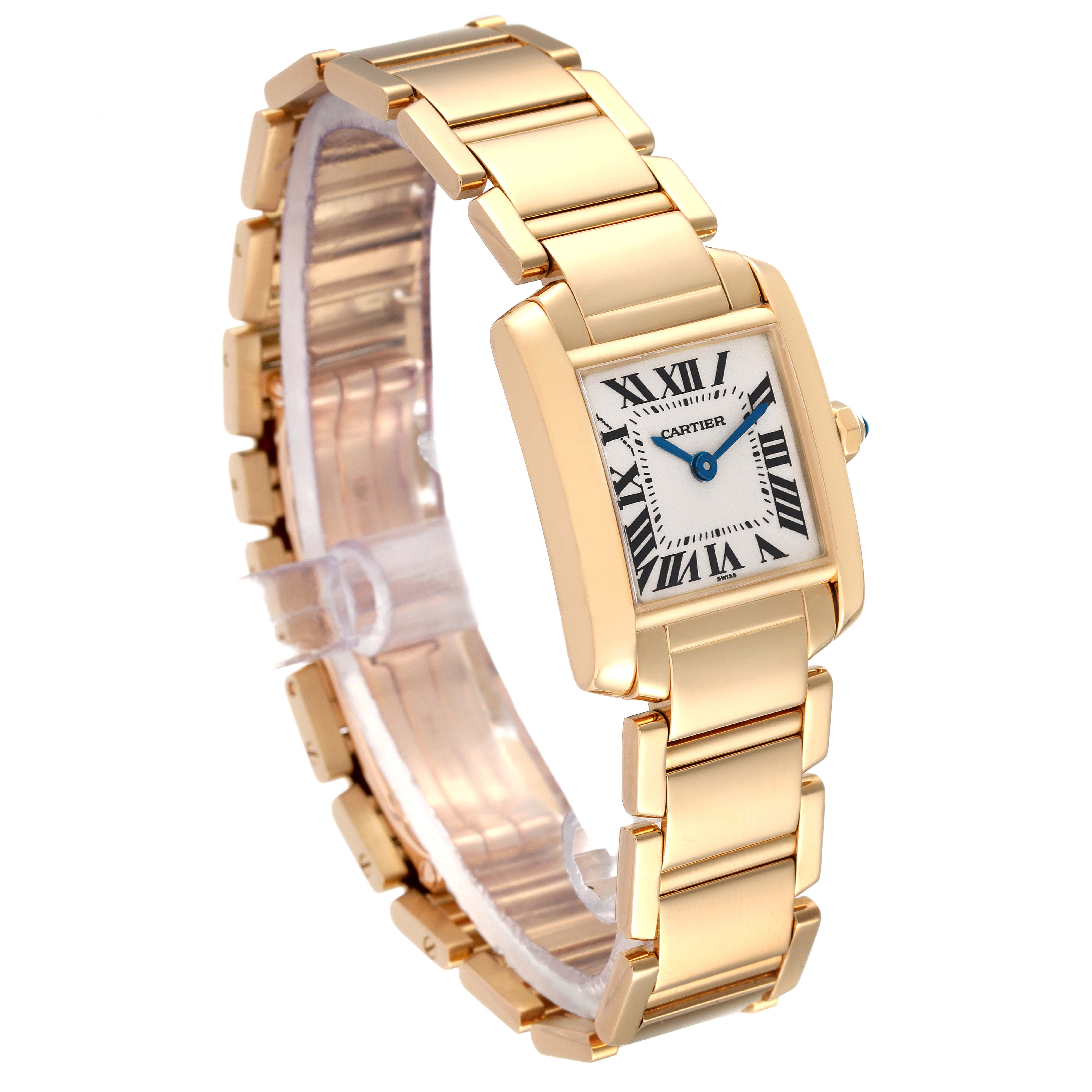 The Cartier Tank Francaise W50002N2 Women's Yellow Gold Silver Dial W50002N2 Women's Yellow Gold Silver Dial watch is shown at a three-quarter angle, highlighting its gold bracelet and rectangular face with Roman numerals.