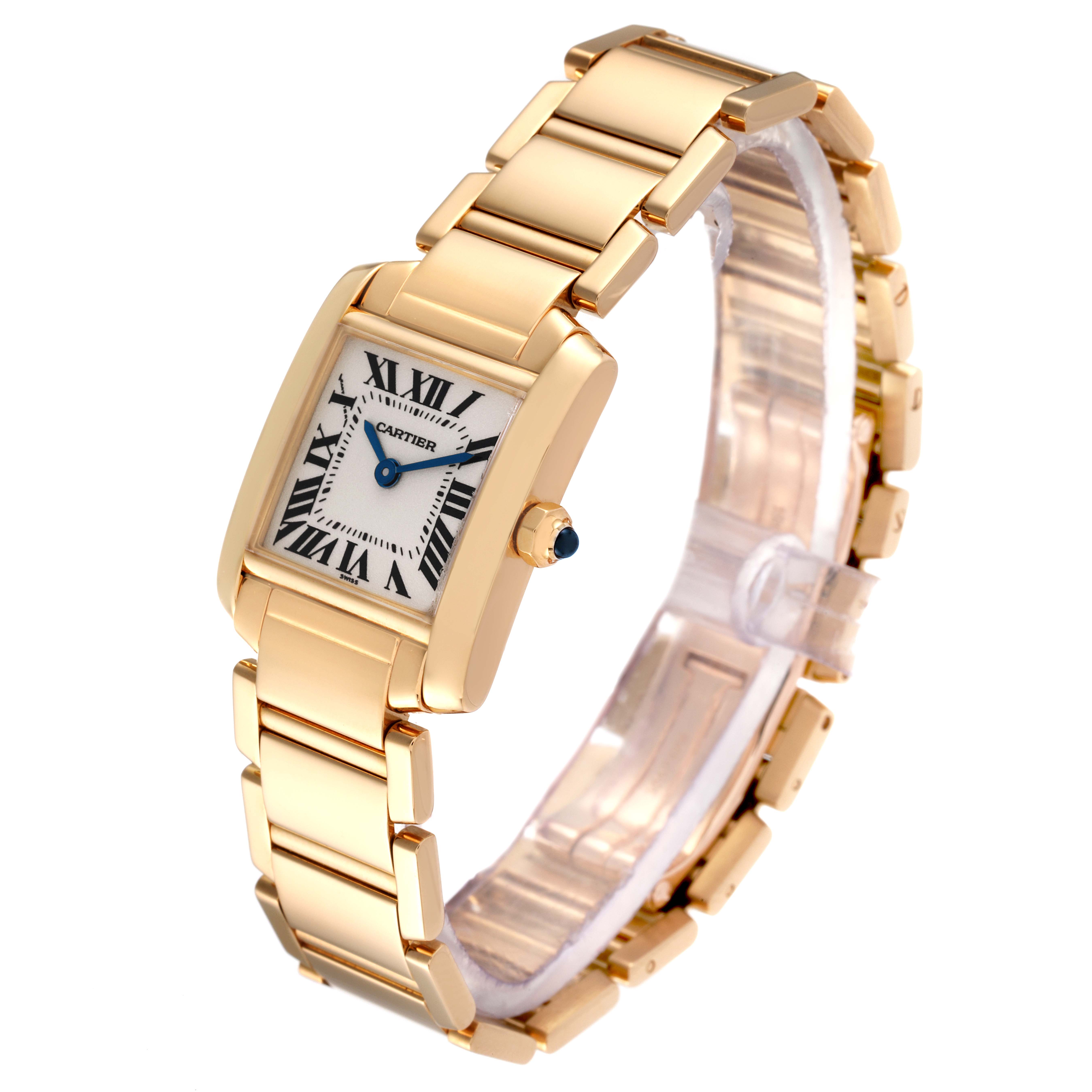 The image shows a Tank Française watch by Cartier at a slight angle, highlighting the watch face, bracelet, and blue gemstone on the crown.