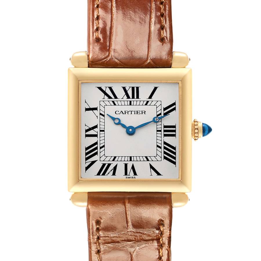 The Cartier Tank Obus W1512256 Women's Yellow Gold Silver Dial watch is shown from the front, displaying its square face, Roman numerals, blue hands, and a leather strap.