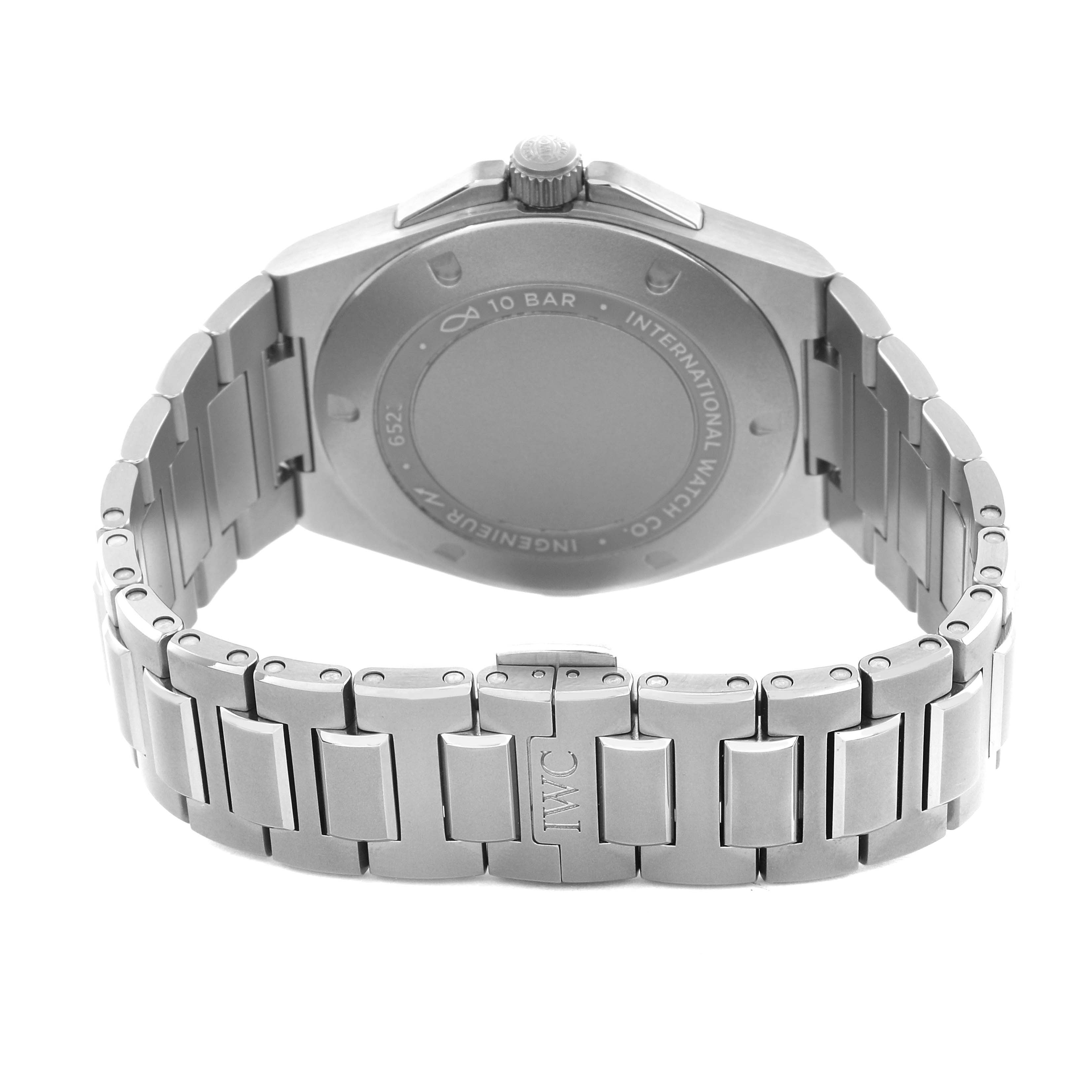 The image shows the back view of the IWC Ingenieur IW328904 Men
s Titanium Grey Dial watch, highlighting the case back, crown, and metal bracelet with an IWC clasp.