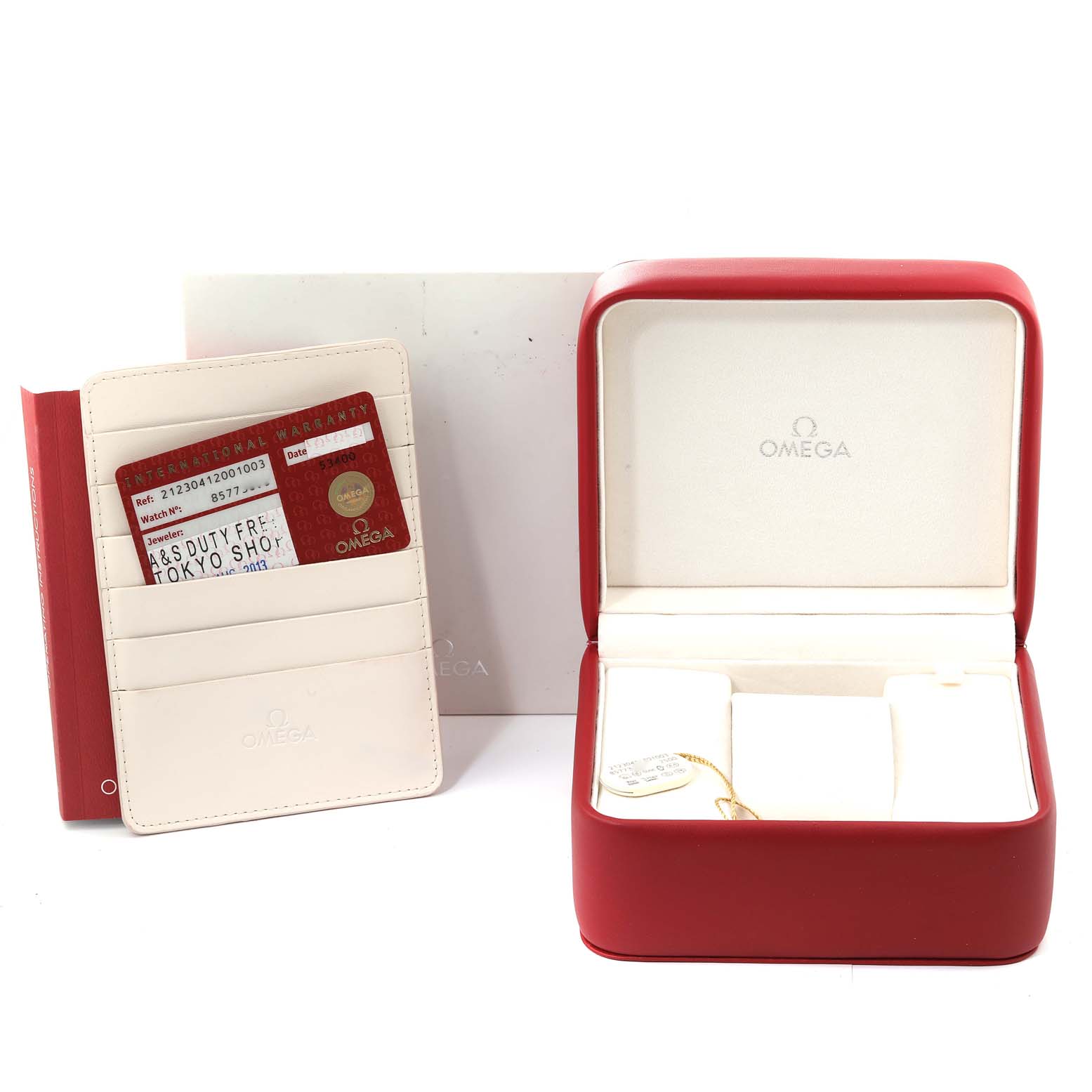 This image shows the open box and warranty card holder for an Omega Seamaster 212.30.41.20.01.003 Men's Stainless Steel Black Dial 212.30.41.20.01.003 Men's Stainless Steel Black Dial watch.