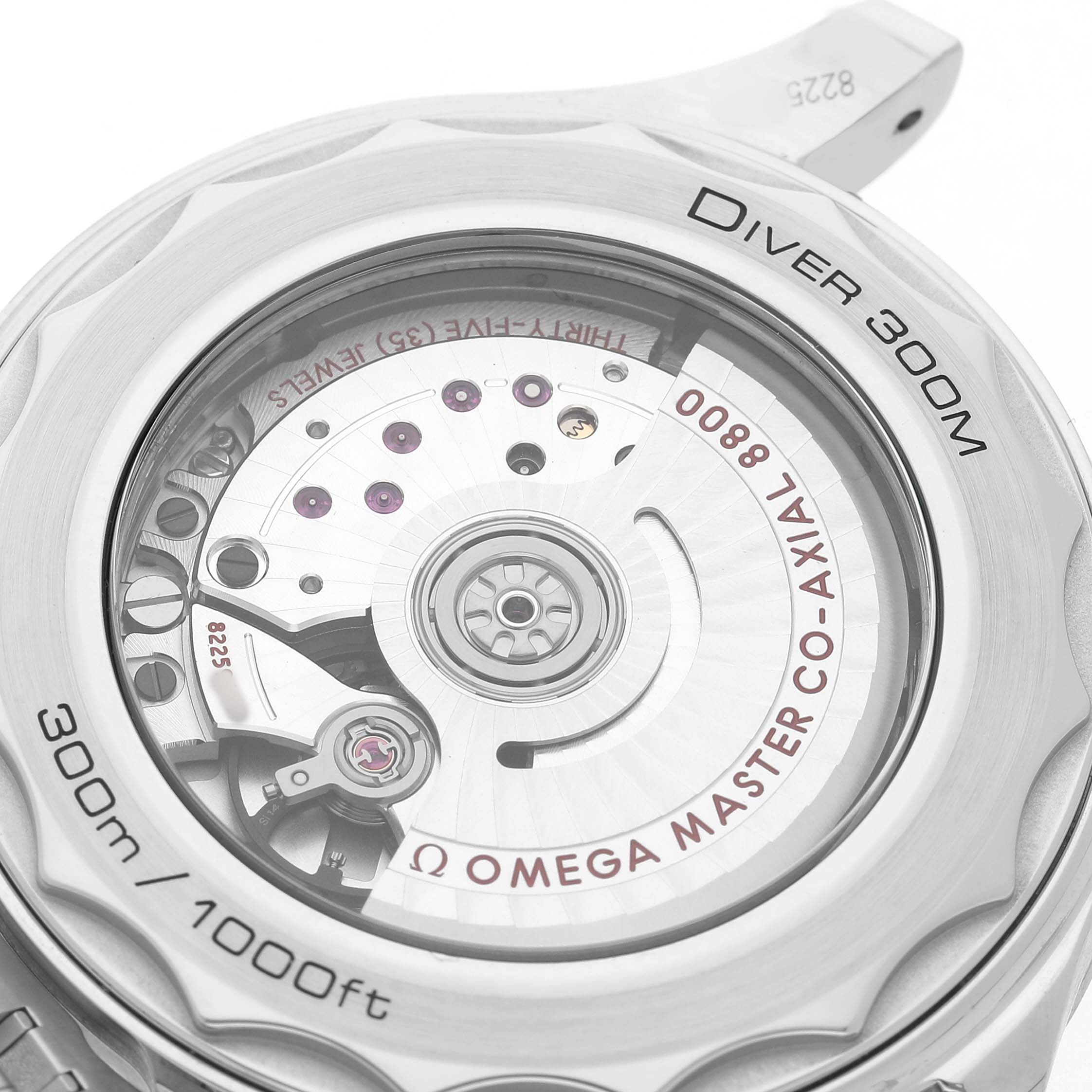 The image shows the back of an Omega Seamaster 210.30.42.20.06.001 Men's Stainless Steel Grey Dial, highlighting the open case back and Co-Axial movement.
