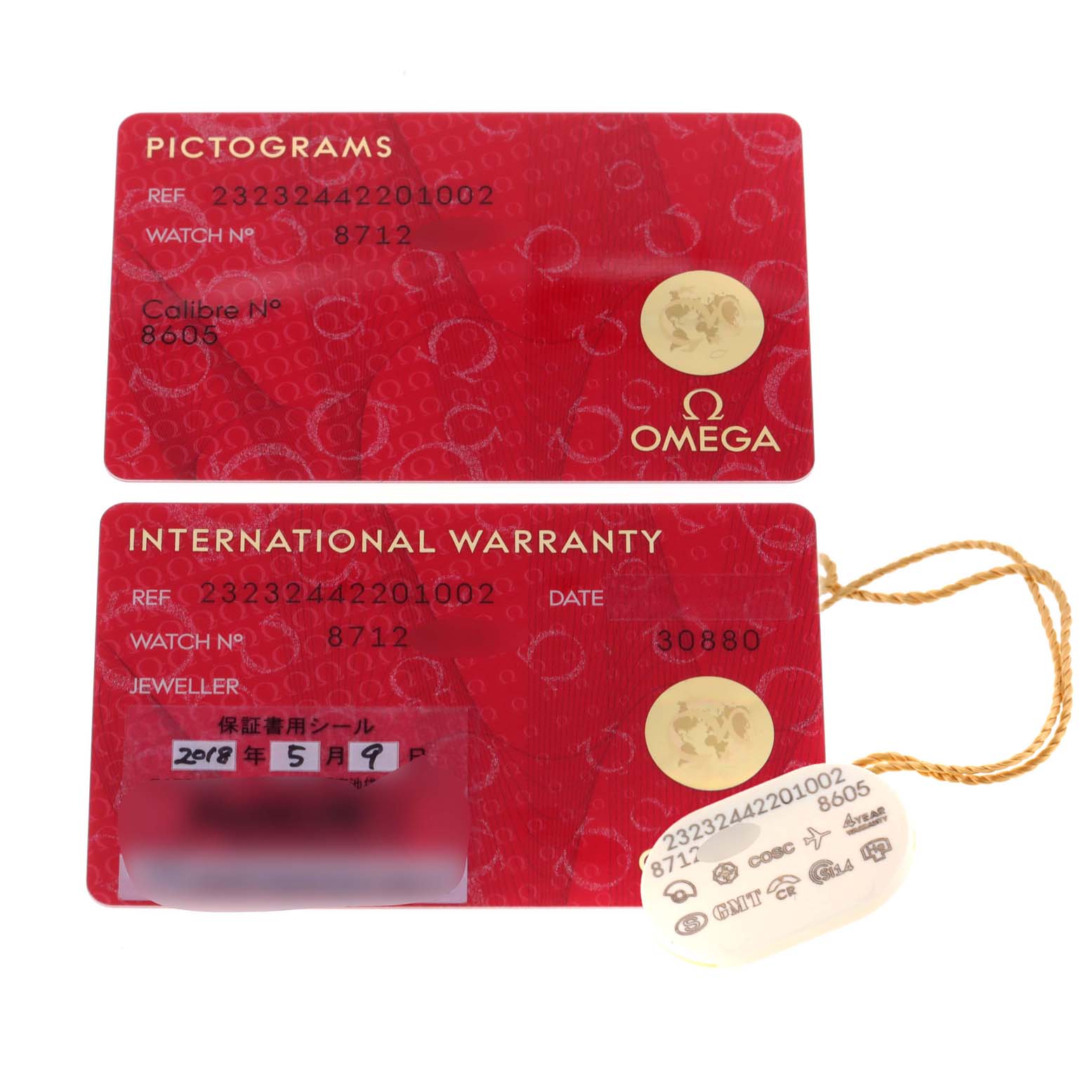 The image shows the Pictograms and International Warranty cards for an Omega Planet Ocean 232.32.44.22.01.002 Men's Stainless Steel Black Dial 232.32.44.22.01.002 Men's Stainless Steel Black Dial watch, along with a tag.