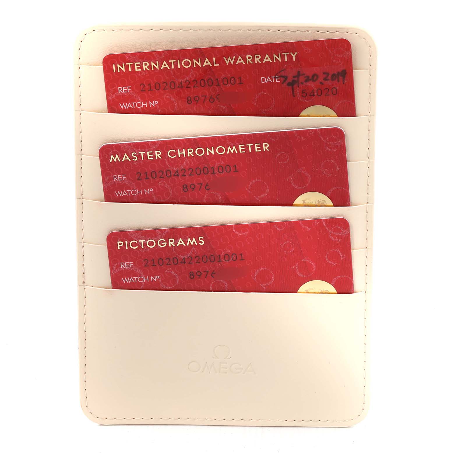 The image shows an Omega Seamaster 210.20.42.20.01.001 Men's Steel and Gold (two tone) Black Dial 210.20.42.20.01.001 Men's Steel and Gold (two tone) Black Dial model's warranty card, master chronometer card, and pictograms card in a beige cardholder.