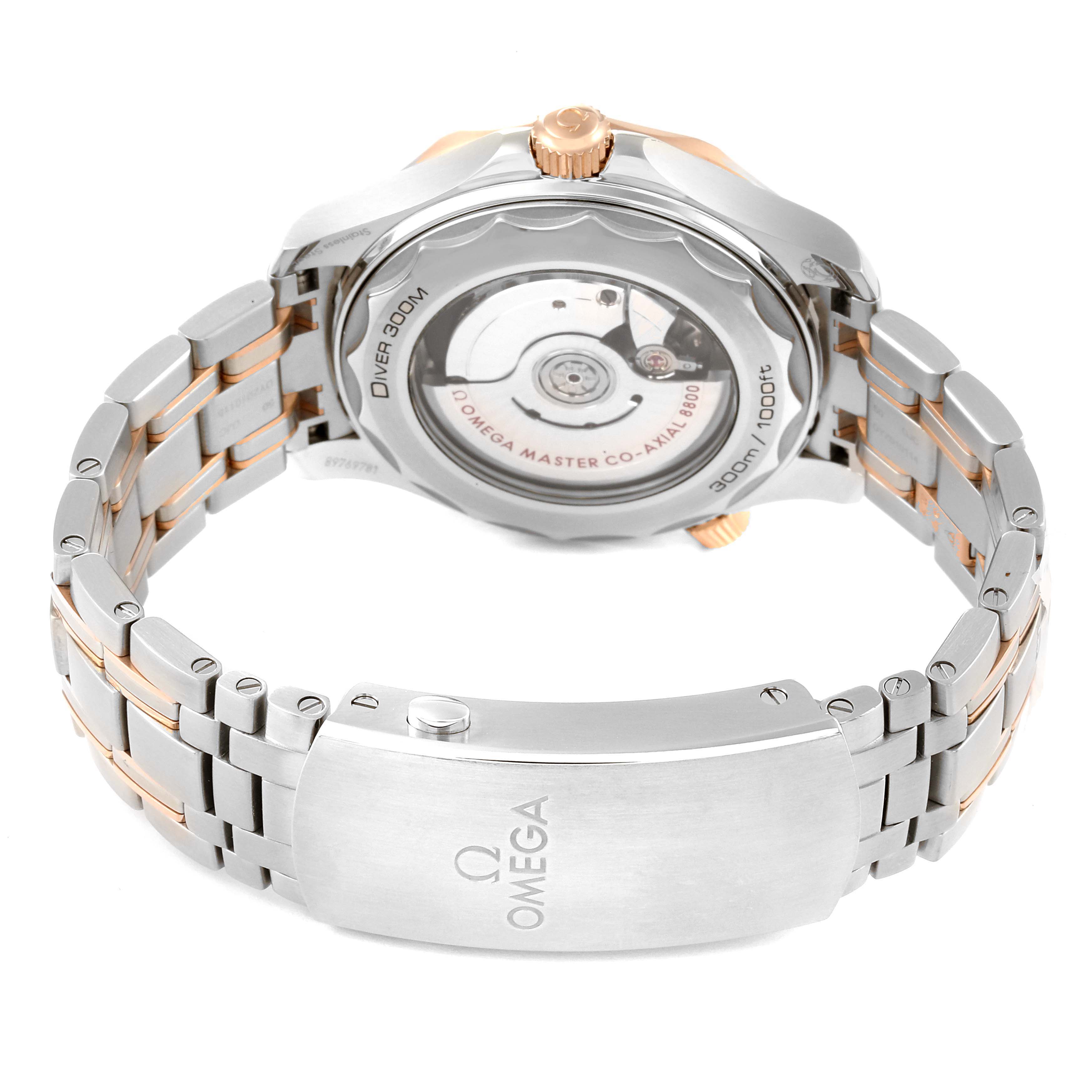 The Omega Seamaster 210.20.42.20.01.001 Men's Steel and Gold (two tone) Black Dial 210.20.42.20.01.001 Men's Steel and Gold (two tone) Black Dial watch is shown from the back, highlighting its open case back, metal bracelet, and clasp with the Omega logo.