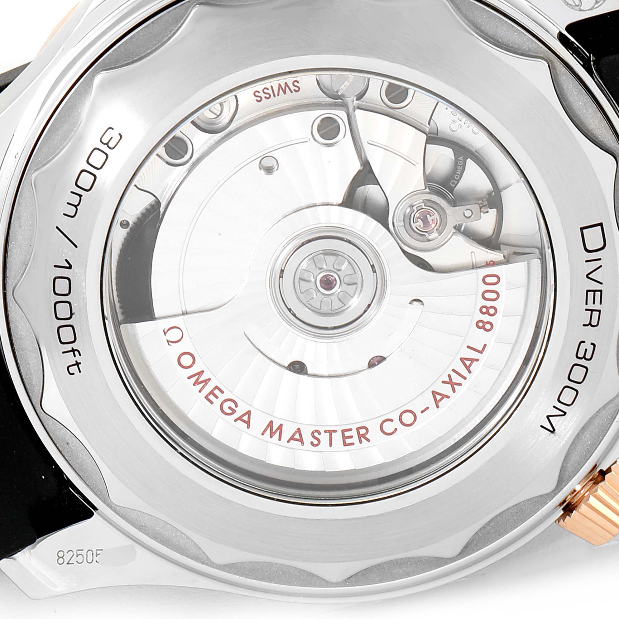 This is a close-up of the case back on an Omega Seamaster 210.22.42.20.01.002 Men's Steel and Gold (two tone) Black Dial 210.22.42.20.01.002 Men's Steel and Gold (two tone) Black Dial Diver 300M, showing the Omega Master Co-Axial 8800 movement.