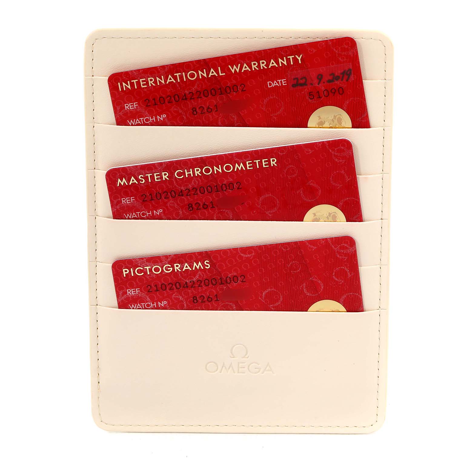 The image shows the warranty cards and certificates for the Omega Seamaster 210.20.42.20.01.002 Men's Steel and Gold (two tone) Black Dial 210.20.42.20.01.002 Men's Steel and Gold (two tone) Black Dial model, neatly placed in a beige leather cardholder.