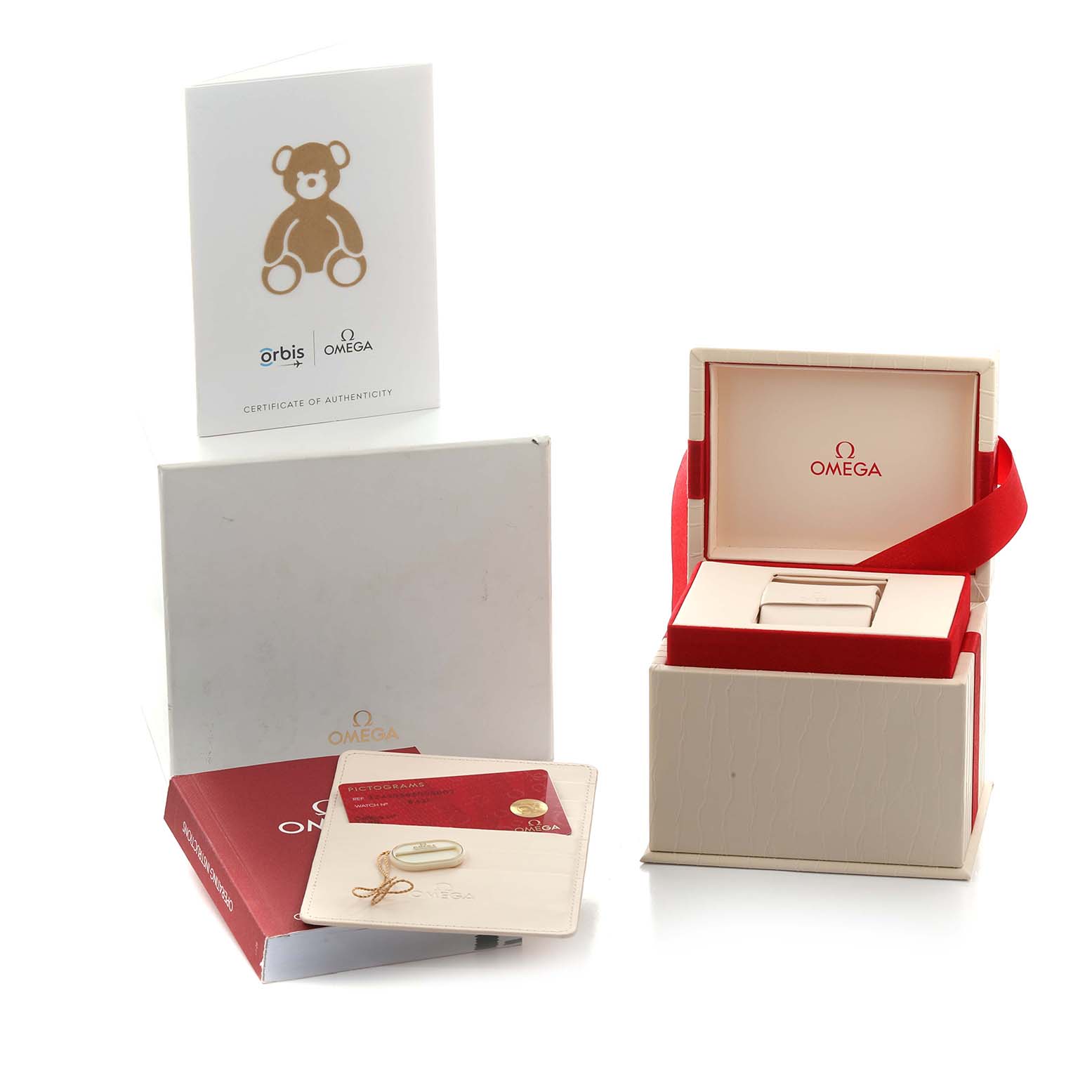 The image shows the packaging and accessories of an Omega Speedmaster 324.30.38.50.03.002 Men
s Stainless Steel Blue Dial, including a box, cards, and a manual, viewed from above.