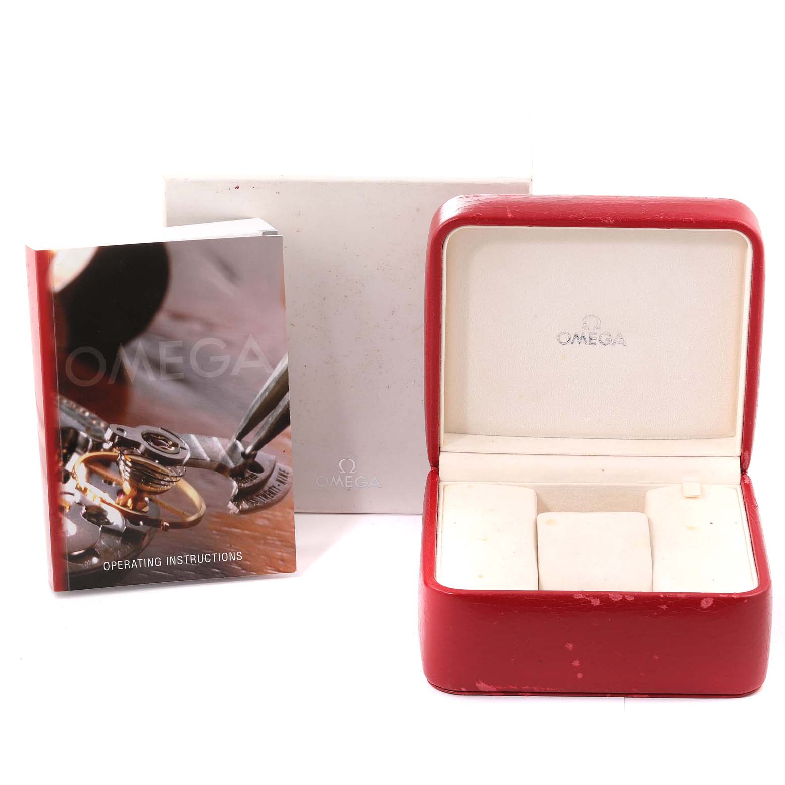 The image shows the Omega Speedmaster 3520.53.00 Men
s Stainless Steel Grey Dial 3520.53.00 Men
s Stainless Steel Grey Dial watch
s operating instructions booklet, a red watch box, and an outer white box.