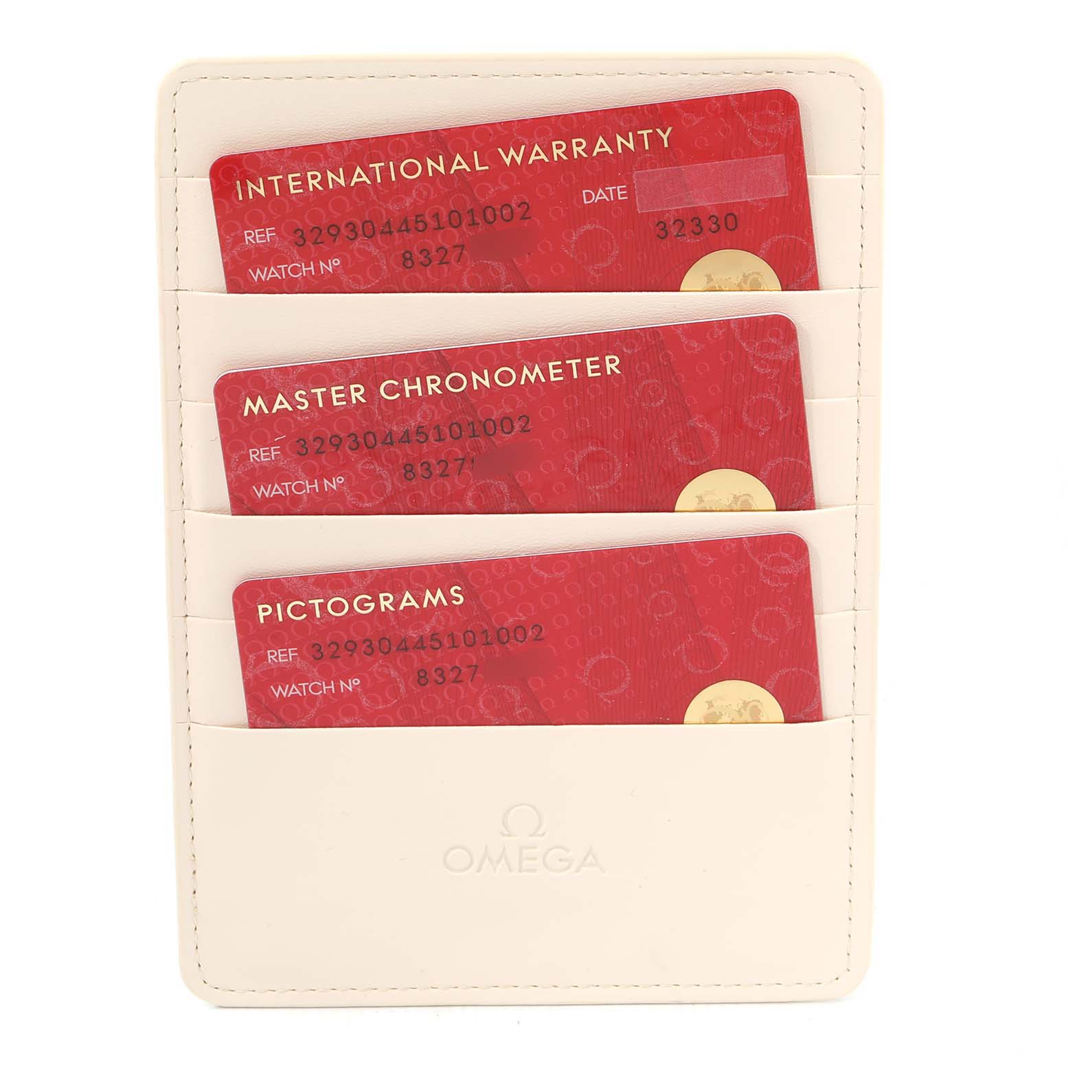 The image displays the international warranty, master chronometer, and pictograms cards for an Omega Speedmaster 329.30.44.51.01.002 Men
s Stainless Steel Black Dial 329.30.44.51.01.002 Men
s Stainless Steel Black Dial watch in a cardholder.