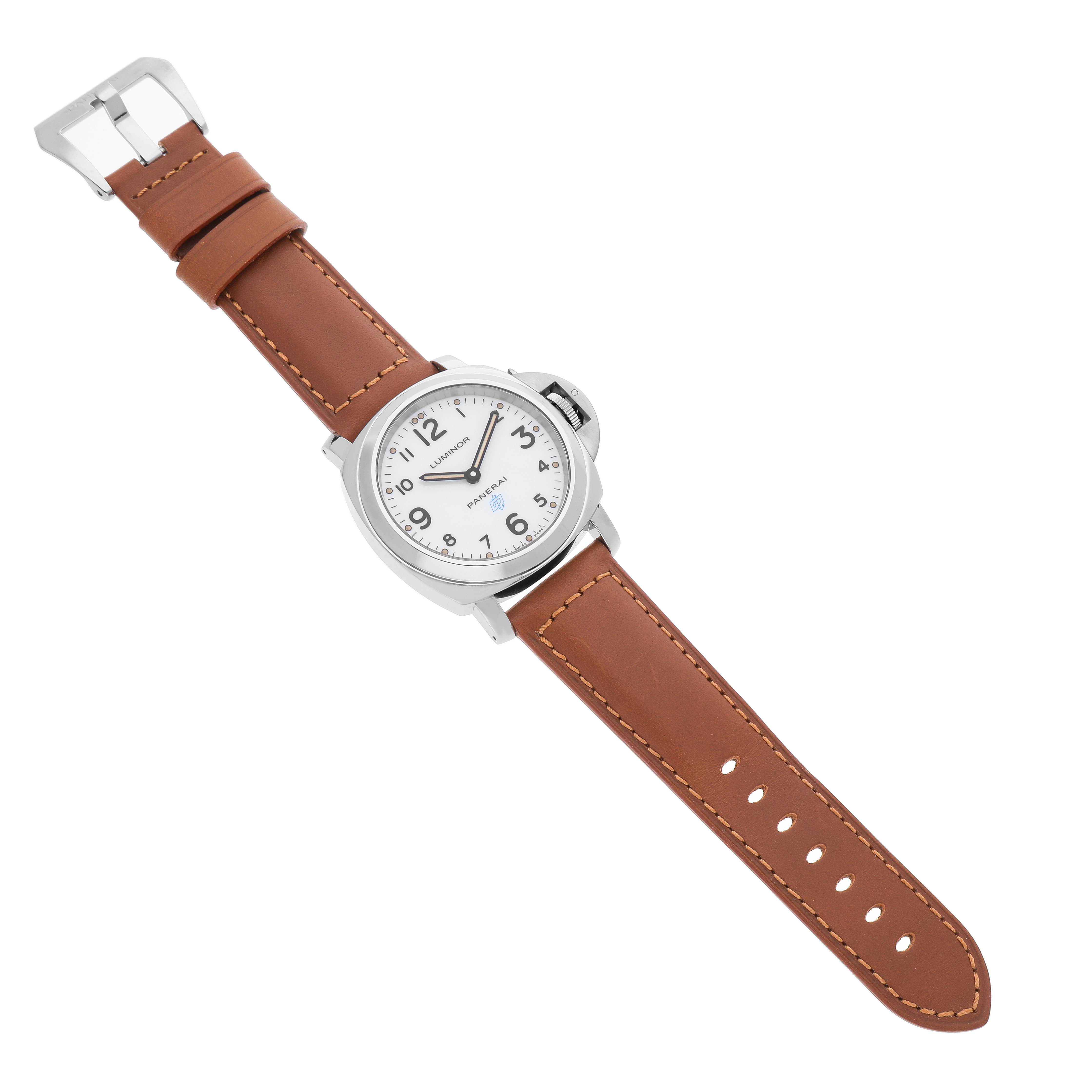 The Panerai Luminor PAM00630 Men's Stainless Steel White Dial watch is shown from a top view, displaying the dial, case, crown guard, and brown leather strap.