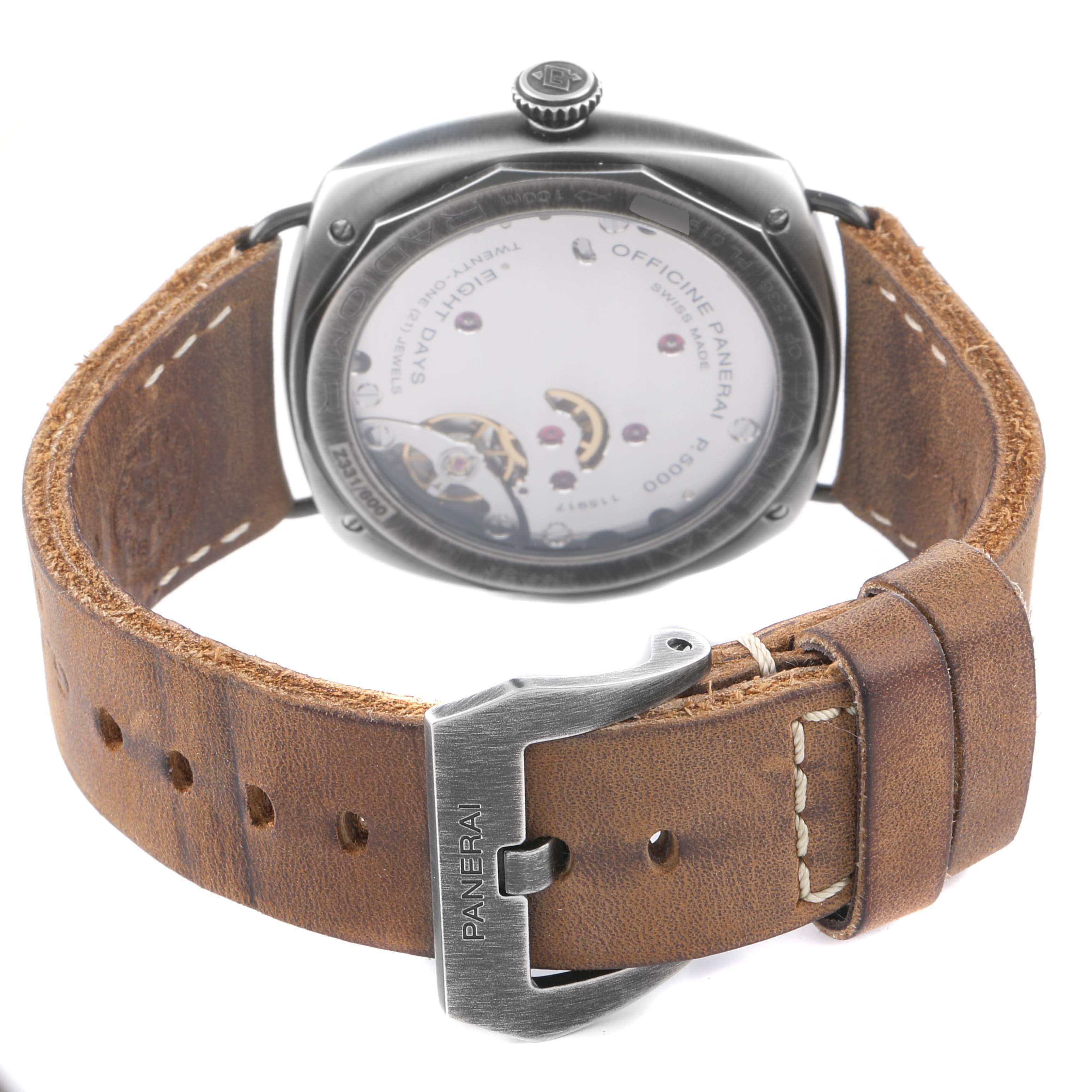 The image shows the back of a Panerai Radiomir PAM01349 Men's Stainless Steel Green Dial watch, highlighting the movement and leather strap with the buckle visible.