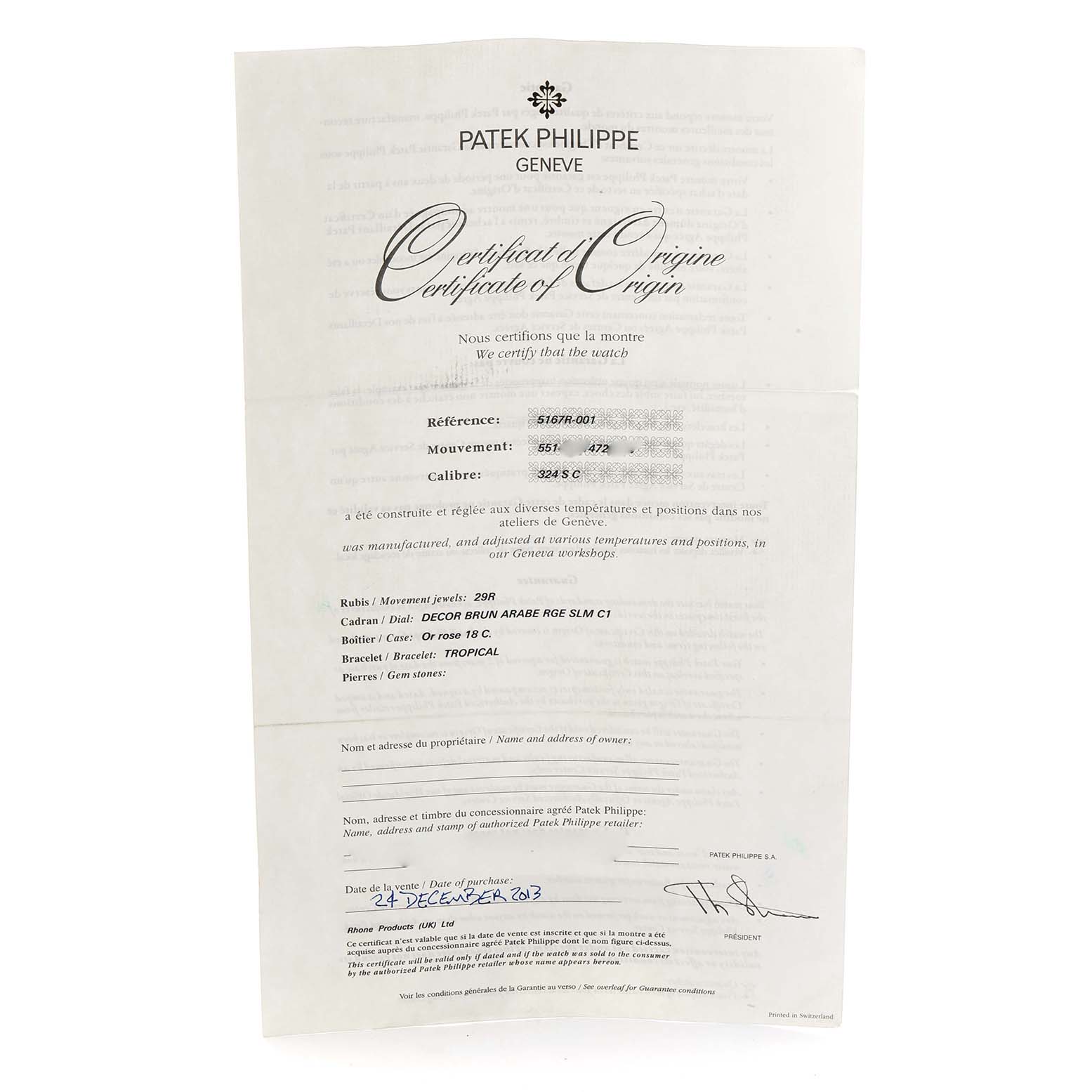 The image shows a Patek Philippe Aquanaut 5167R Men
s Rose Gold Brown Dial certificate of origin, photographed from above.