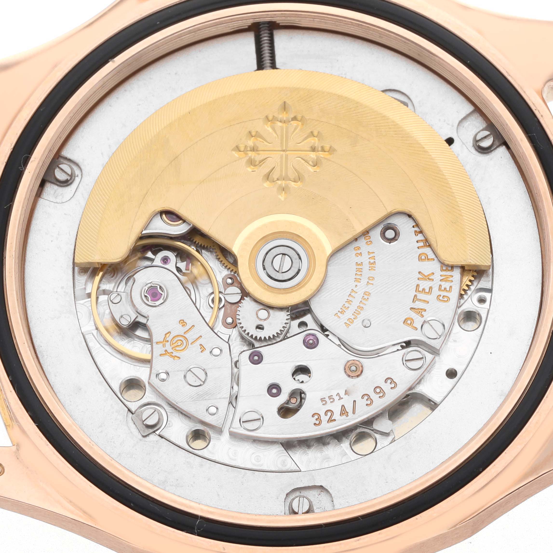 The image shows the movement and rotor of the Patek Philippe Aquanaut 5167R Men
s Rose Gold Brown Dial from a rear angle.