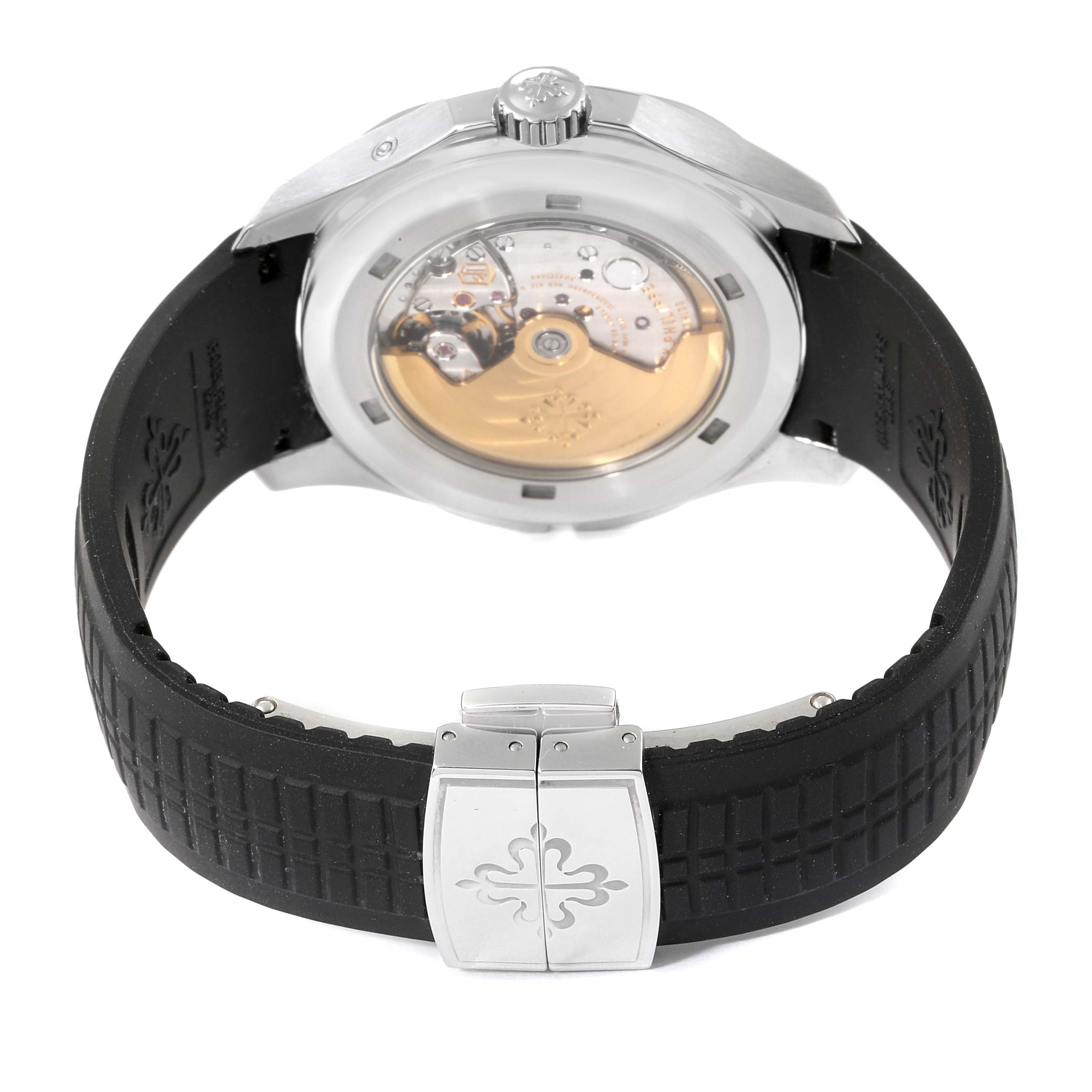 The image shows the back view of the Patek Philippe Aquanaut 5164A Men's Stainless Steel Black Dial 5164A Men's Stainless Steel Black Dial, revealing its movement and clasp.