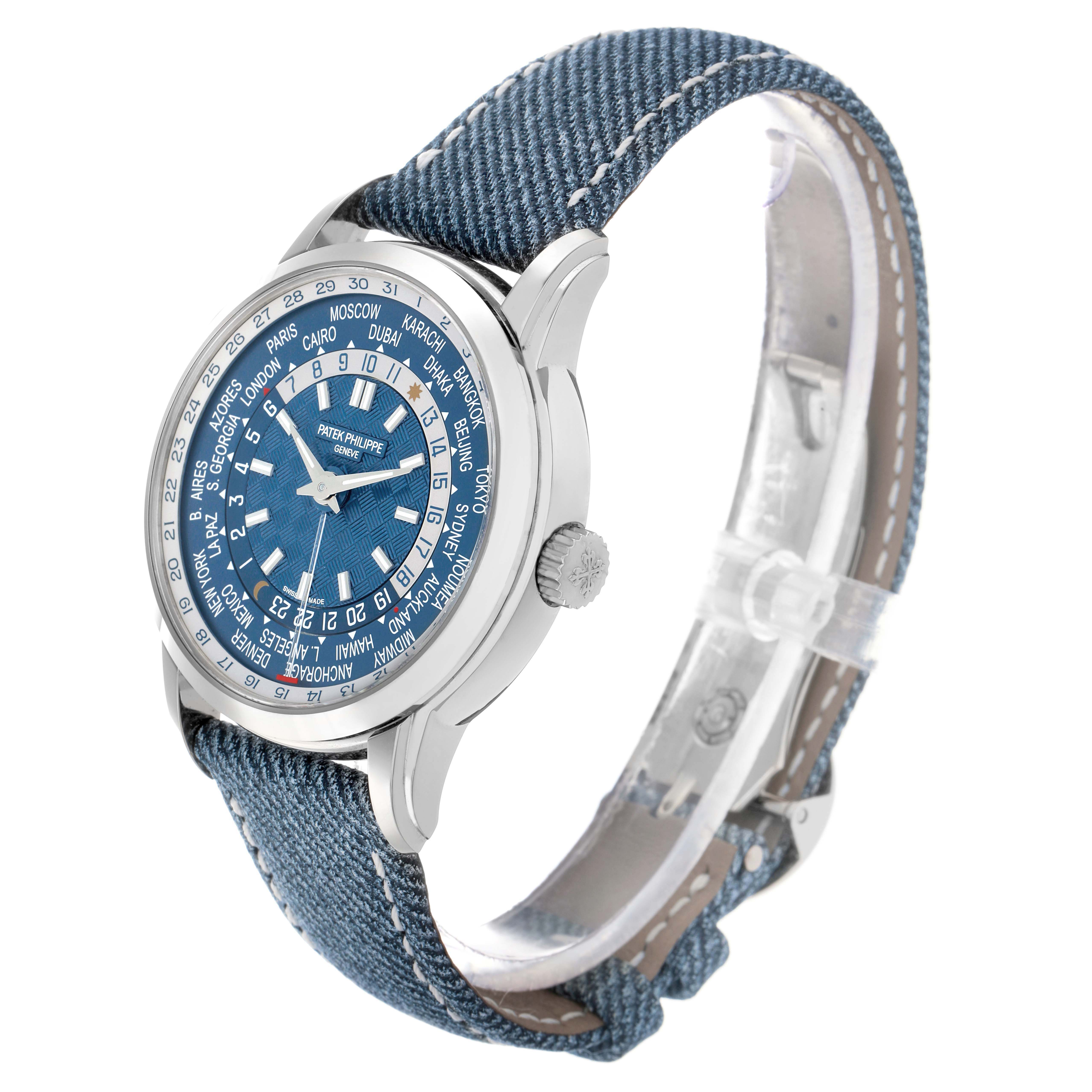The Patek Philippe Complications 5330G Men's White Gold Blue Dial watch is shown in a side angle, highlighting its face, bezel, and blue strap.