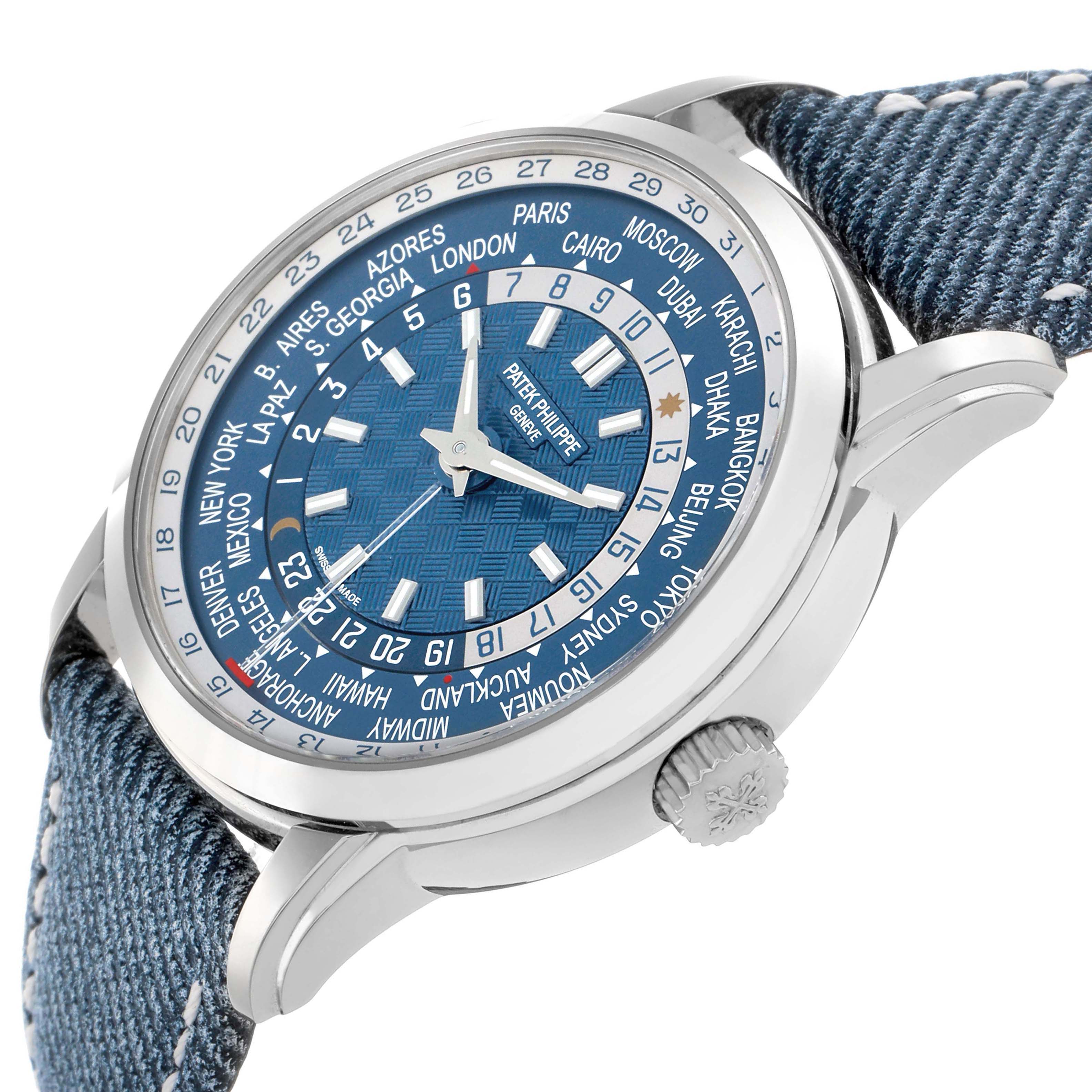 The Patek Philippe Complications 5330G Men's White Gold Blue Dial model is shown from a side angle, displaying the dial, bezel, crown, and blue strap.
