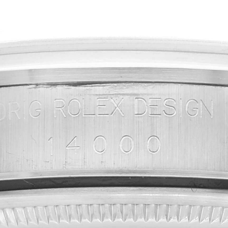 This image shows a close-up of the side profile of a Rolex Air-King 14000 Men's Stainless Steel White Dial 14000 Men's Stainless Steel White Dial model with the engraving "ROLEX DESIGN 14000" visible.