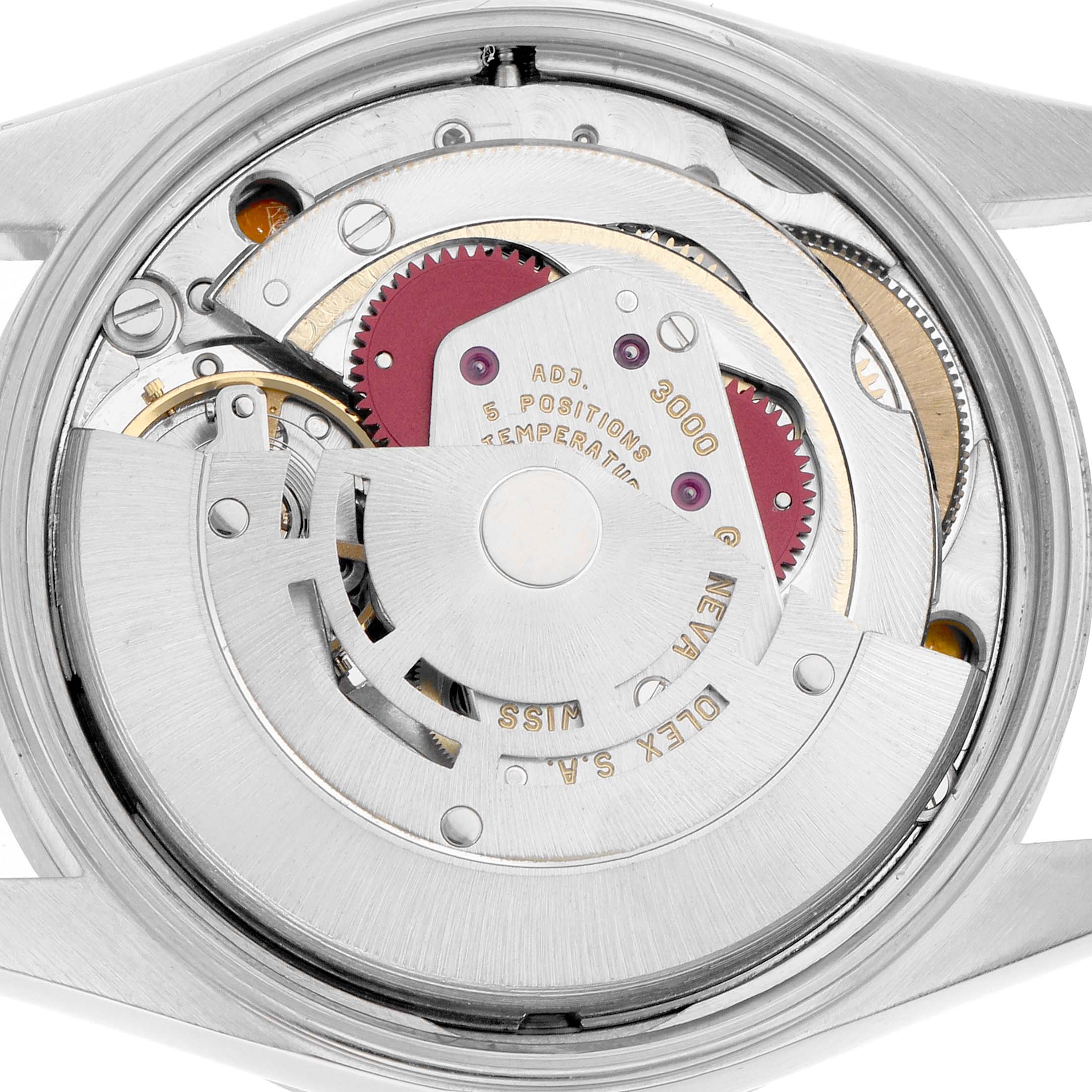 The image shows a top-down view of the Rolex Air-King 14010 Men
s Stainless Steel Blue Dial
s inner movement components.