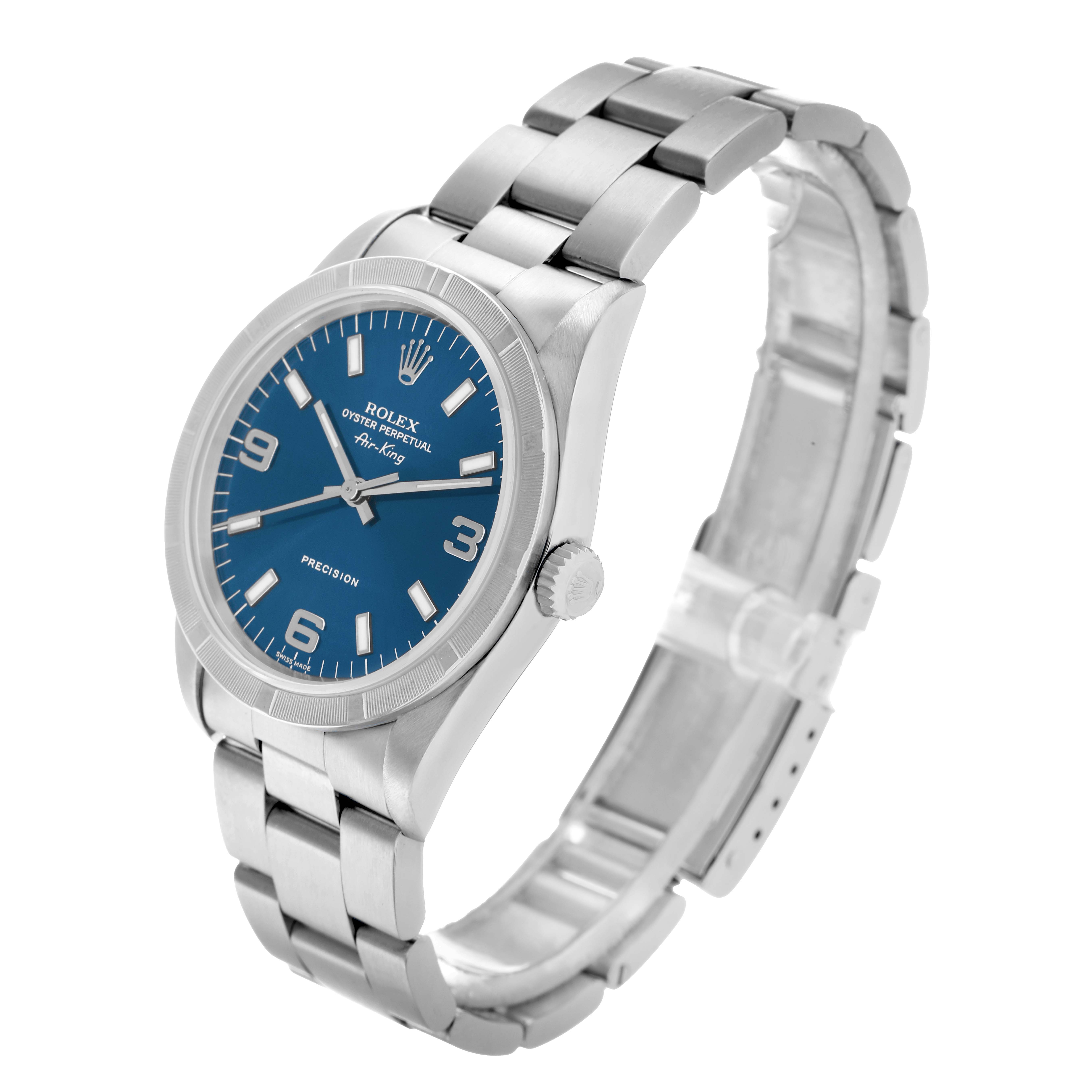 The Rolex Air-King 14010 Men
s Stainless Steel Blue Dial watch is shown at an angled side view, highlighting the dial, crown, and stainless steel bracelet.