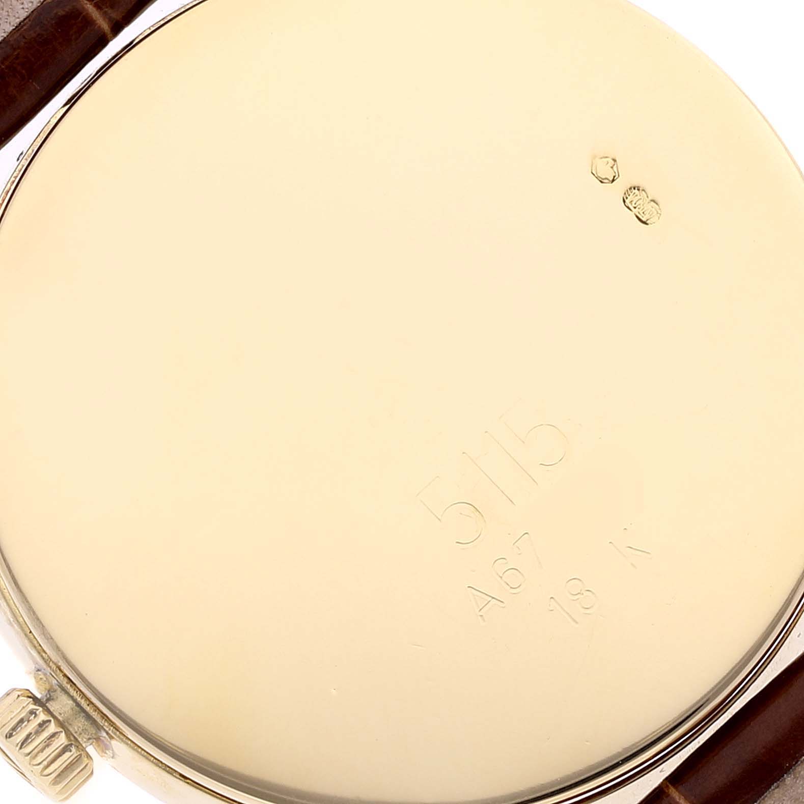 The image shows the back case of a Rolex Cellini 5115/8 Men's Yellow Gold Silver Dial 5115/8 Men's Yellow Gold Silver Dial watch, highlighting the model number and gold markings.