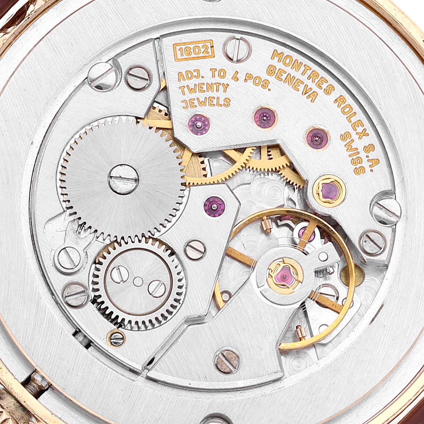 This image shows the intricate internal mechanism of a Rolex Cellini 5115/8 Men's Yellow Gold Silver Dial 5115/8 Men's Yellow Gold Silver Dial watch, viewed from the back.