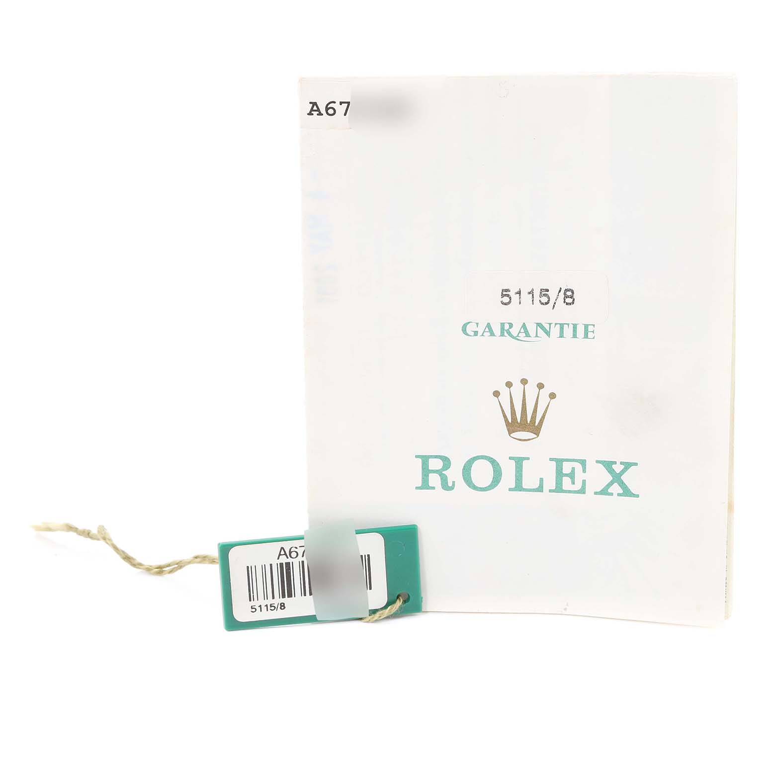 The image shows a warranty booklet and a tag for the Rolex Cellini 5115/8 Men's Yellow Gold Silver Dial 5115/8 Men's Yellow Gold Silver Dial model 5115/8.