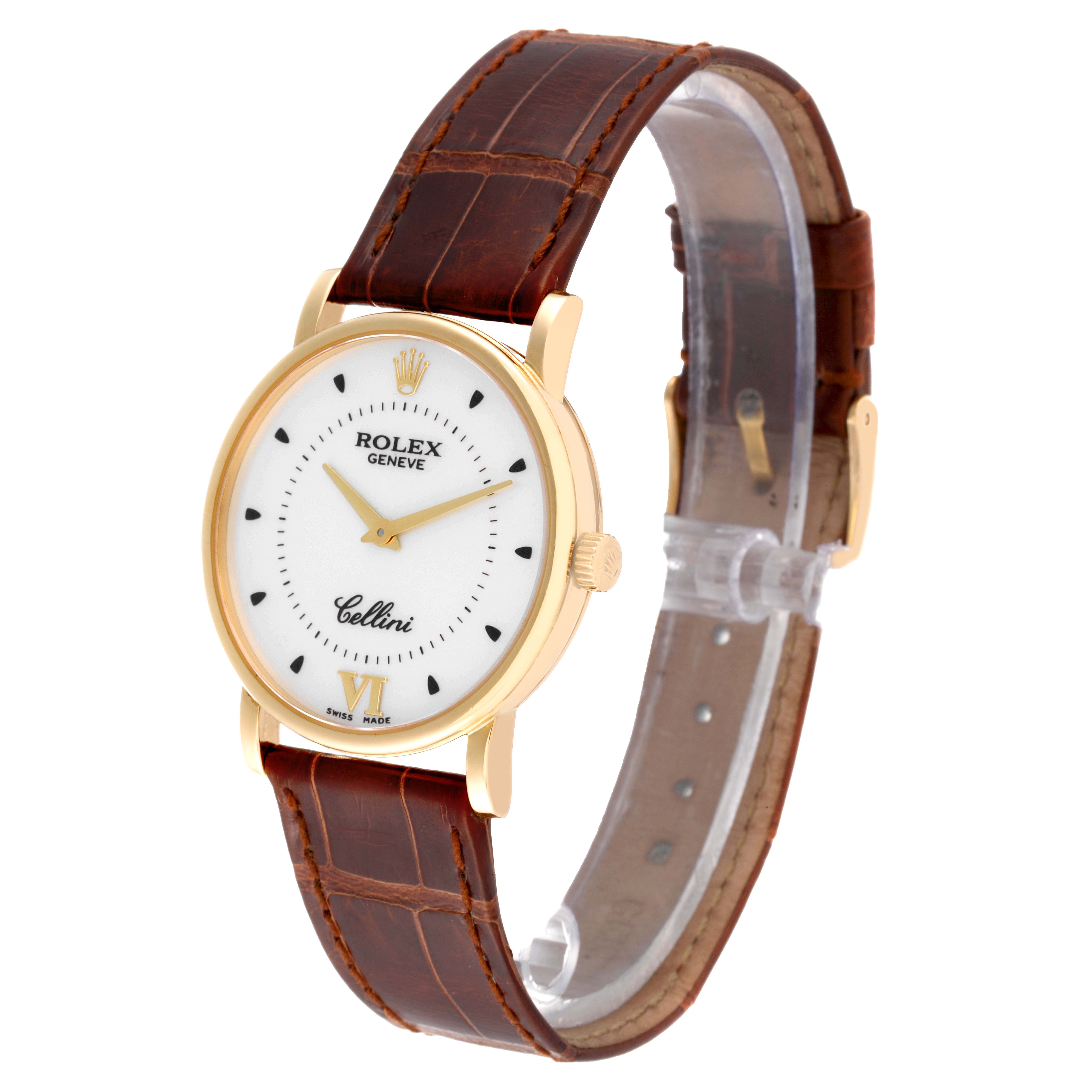 The watch, a Rolex Cellini 5115/8 Men's Yellow Gold Silver Dial 5115/8 Men's Yellow Gold Silver Dial model, is shown at a three-quarter angle, displaying its face, crown, and leather strap.