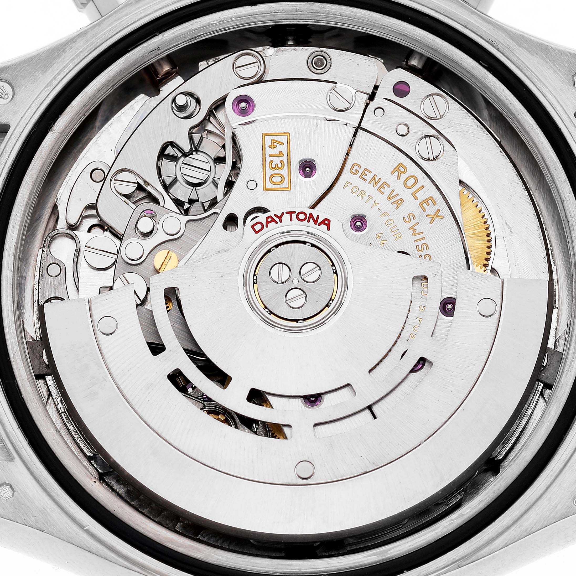 The image shows the movement and inner workings of a Rolex Daytona 116519LN Men's White Gold Silver Dial watch from a top-down angle.