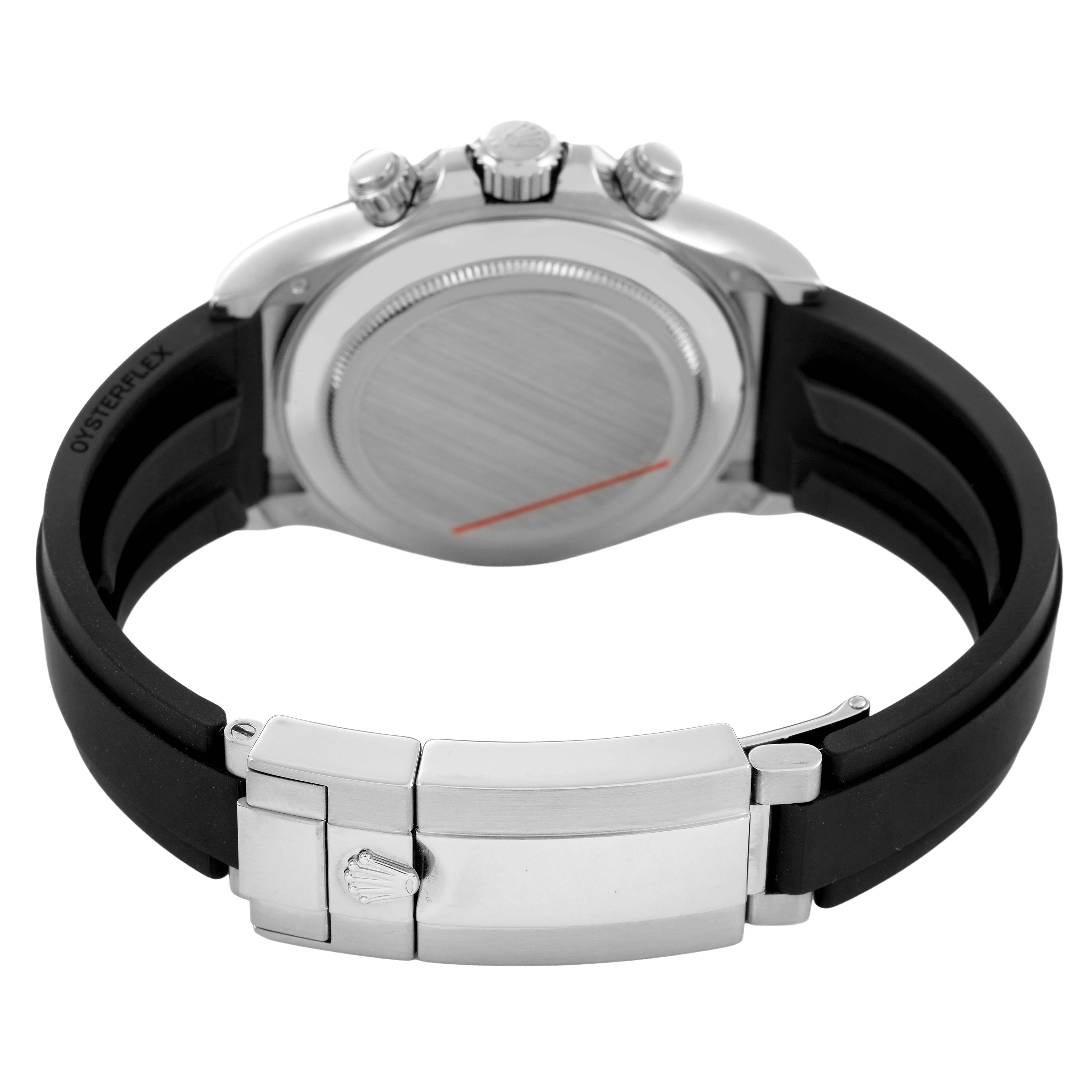 The image shows the back view of a Rolex Daytona 116519LN Men's White Gold Silver Dial, highlighting its case back, bracelet clasp, and pushers.