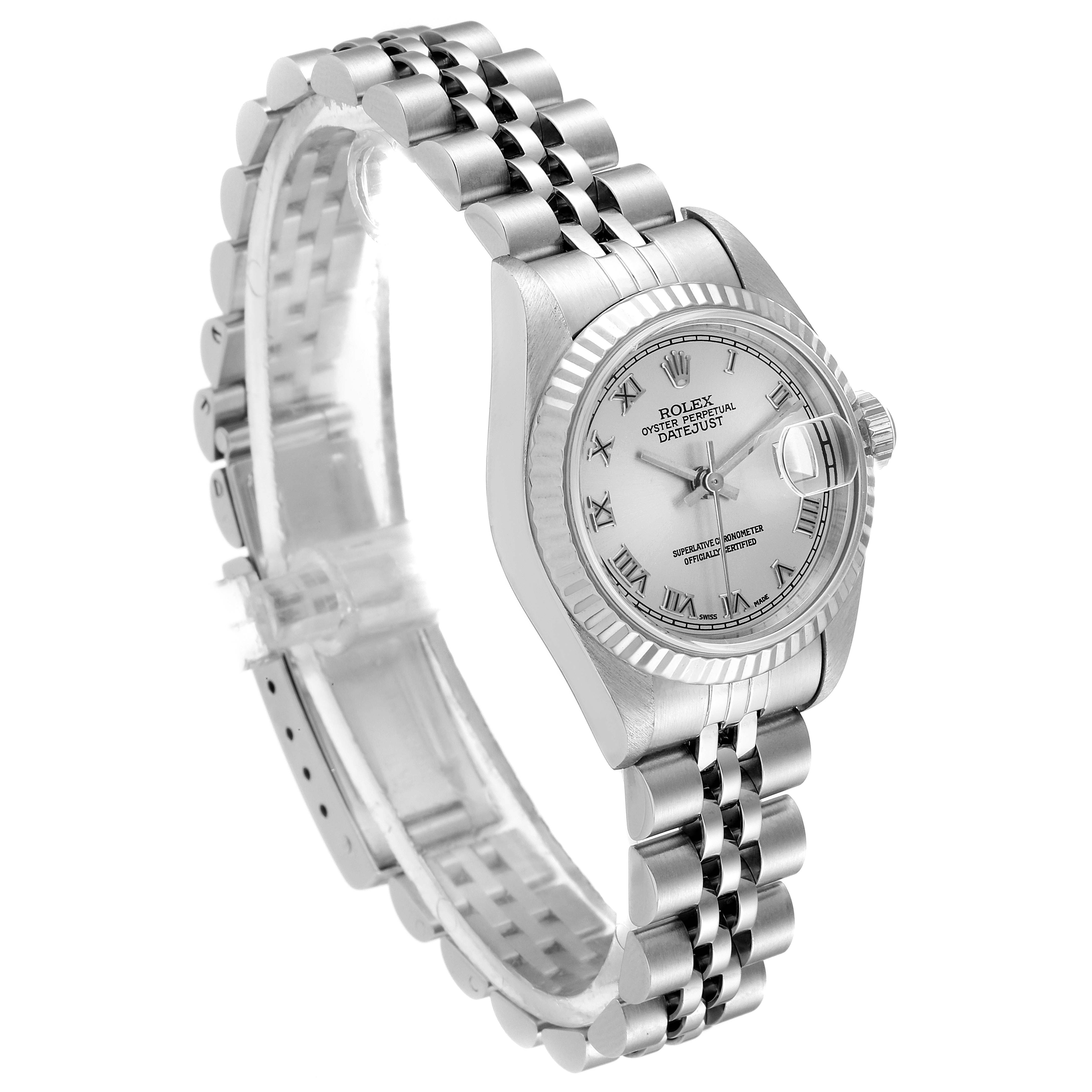 The Rolex Datejust 69174 Women
s Stainless Steel Silver Dial 69174 Women
s Stainless Steel Silver Dial watch is shown at a three-quarter angle, showcasing its silver bracelet, case, and Roman numeral dial.
