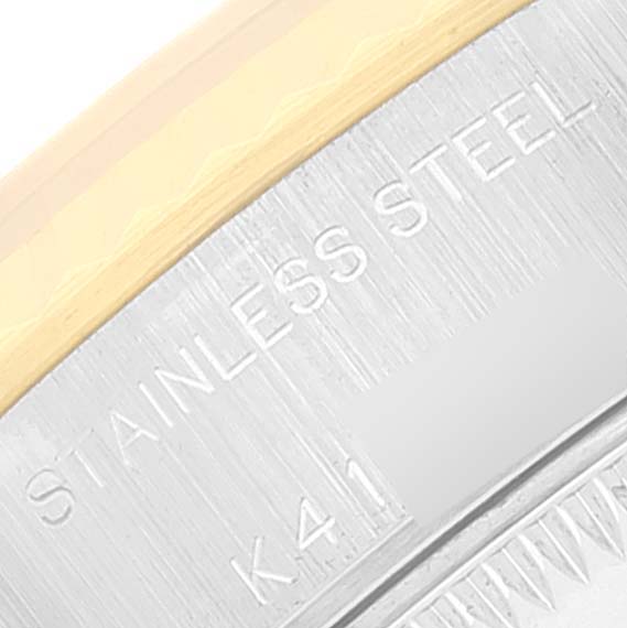 The image shows a close-up of the case back of a Rolex Datejust 79173 Women's Steel and Gold (two tone) Beige Dial 79173 Women's Steel and Gold (two tone) Beige Dial watch, featuring "STAINLESS STEEL" engraving.