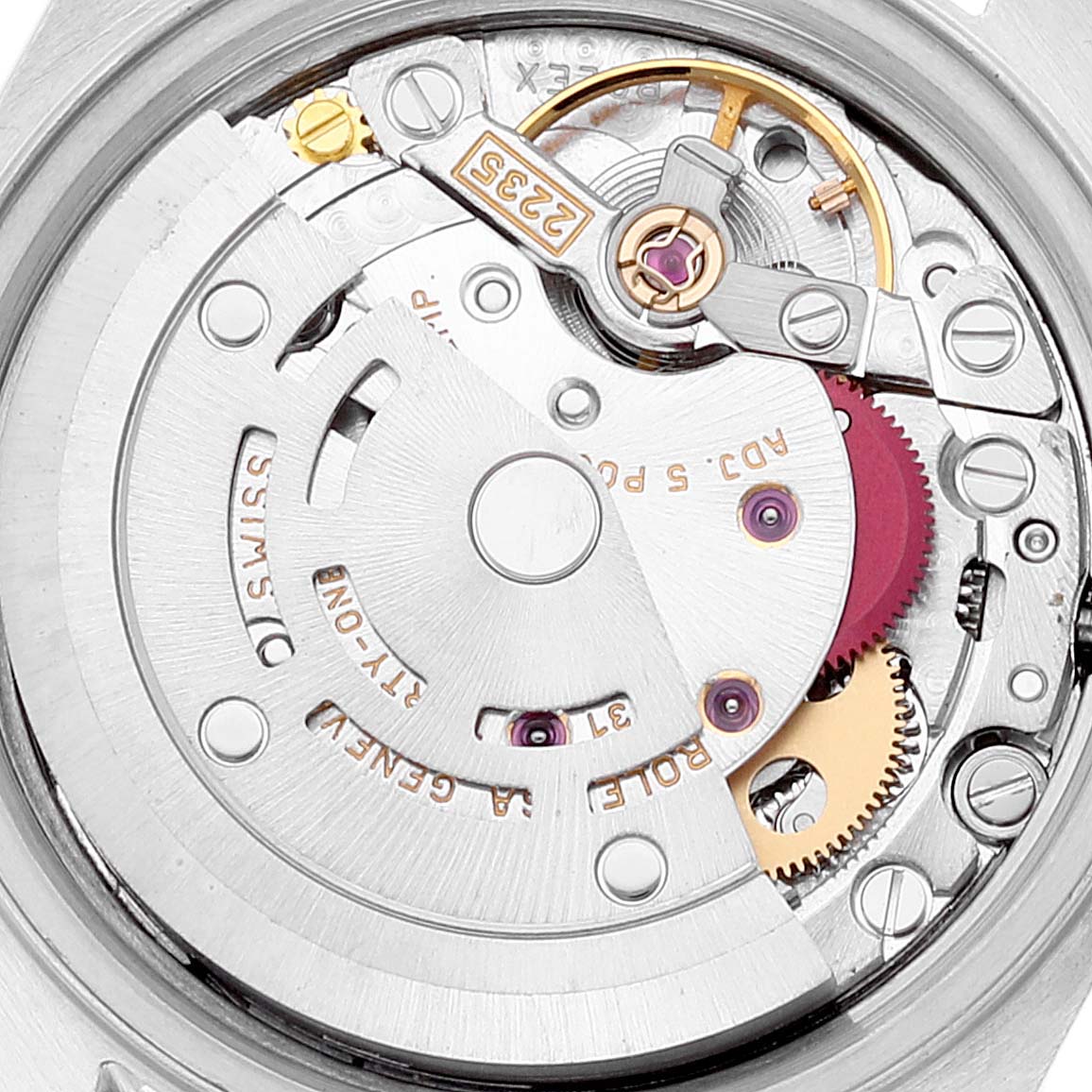This is an image of the movement mechanism inside a Rolex Datejust 79173 Women's Steel and Gold (two tone) Beige Dial 79173 Women's Steel and Gold (two tone) Beige Dial watch, showing gears, screws, and intricate components.