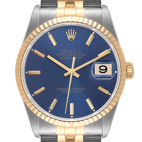 This image shows a close-up, front view of the Rolex Datejust watch, showcasing its blue dial, gold hands, date window, and two-tone bracelet.